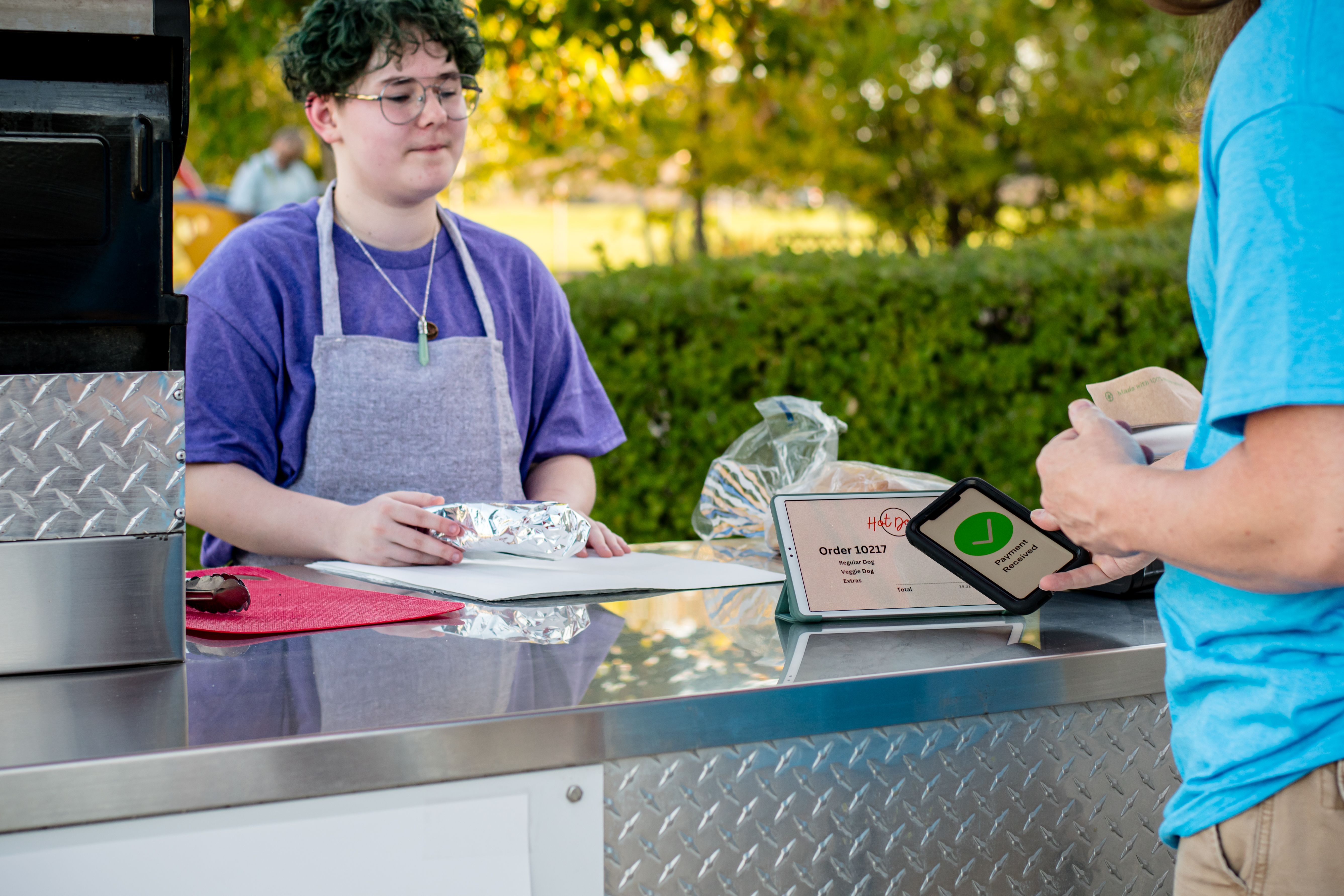 Innovative Payment at the Hot Dog Stand : 17 year old Teen and Customer Interaction with digital payments
