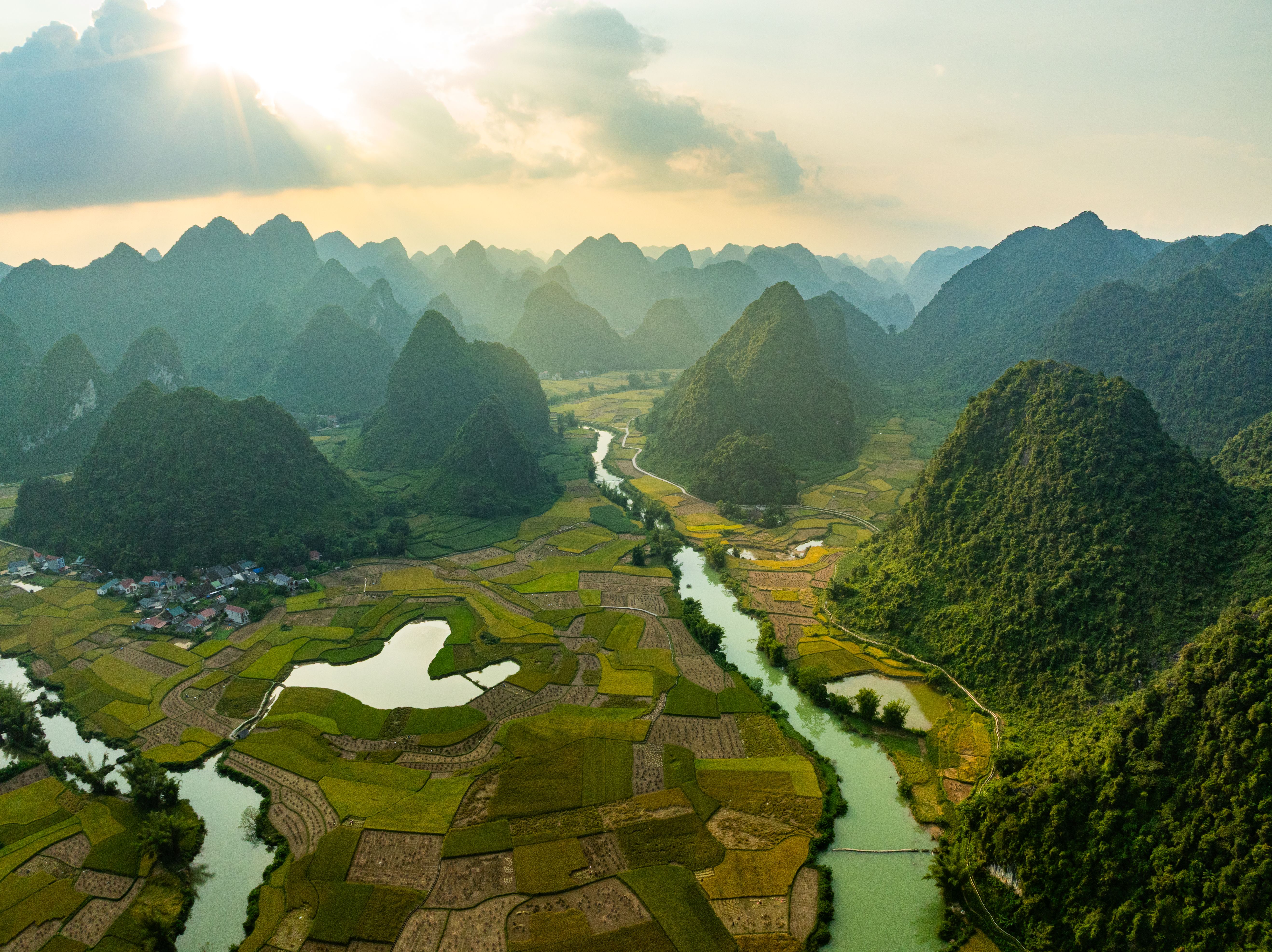 Aerial top view of Green rice field at northern vietnam,Beautiful destination in Northern Vietnam,Travel and landscape concept, Nature and rice fields background