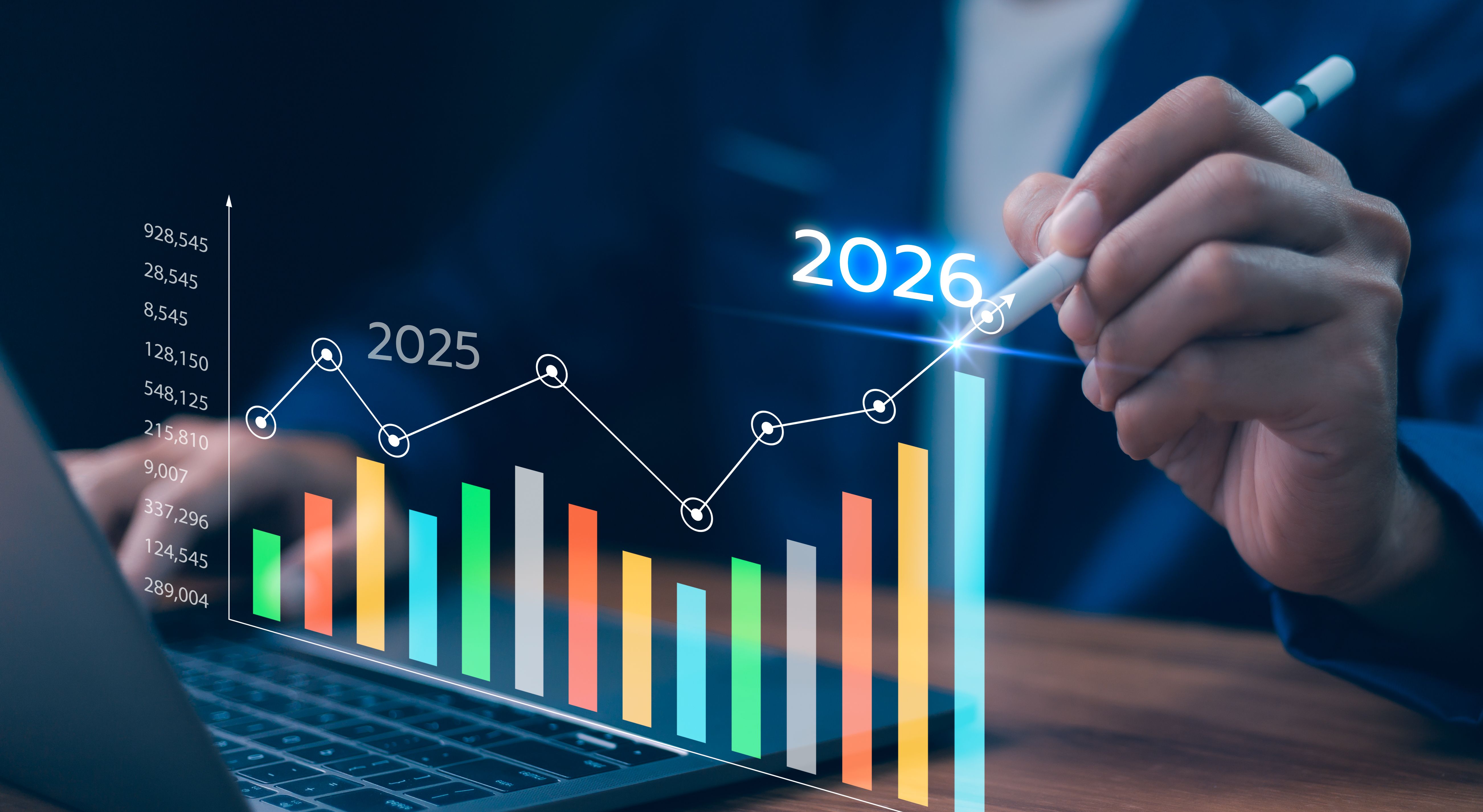 2025 to 2026 Business Growth and Investment Strategy. Hand showing a glowing bar chart and line graph, increasing financial performance, market analysis, and successful investment in digital economy.