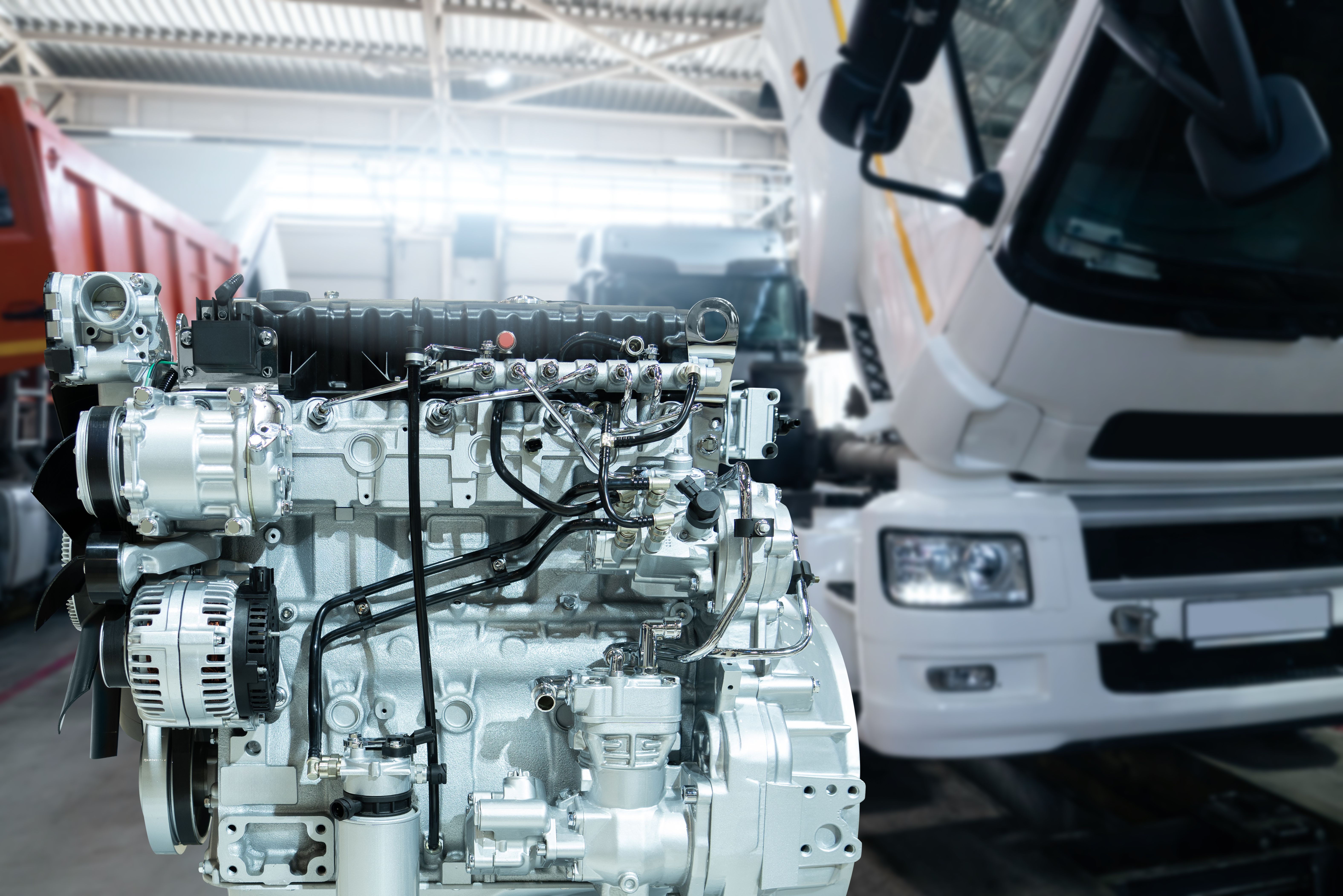 Disassembled engine at a truck repair service.