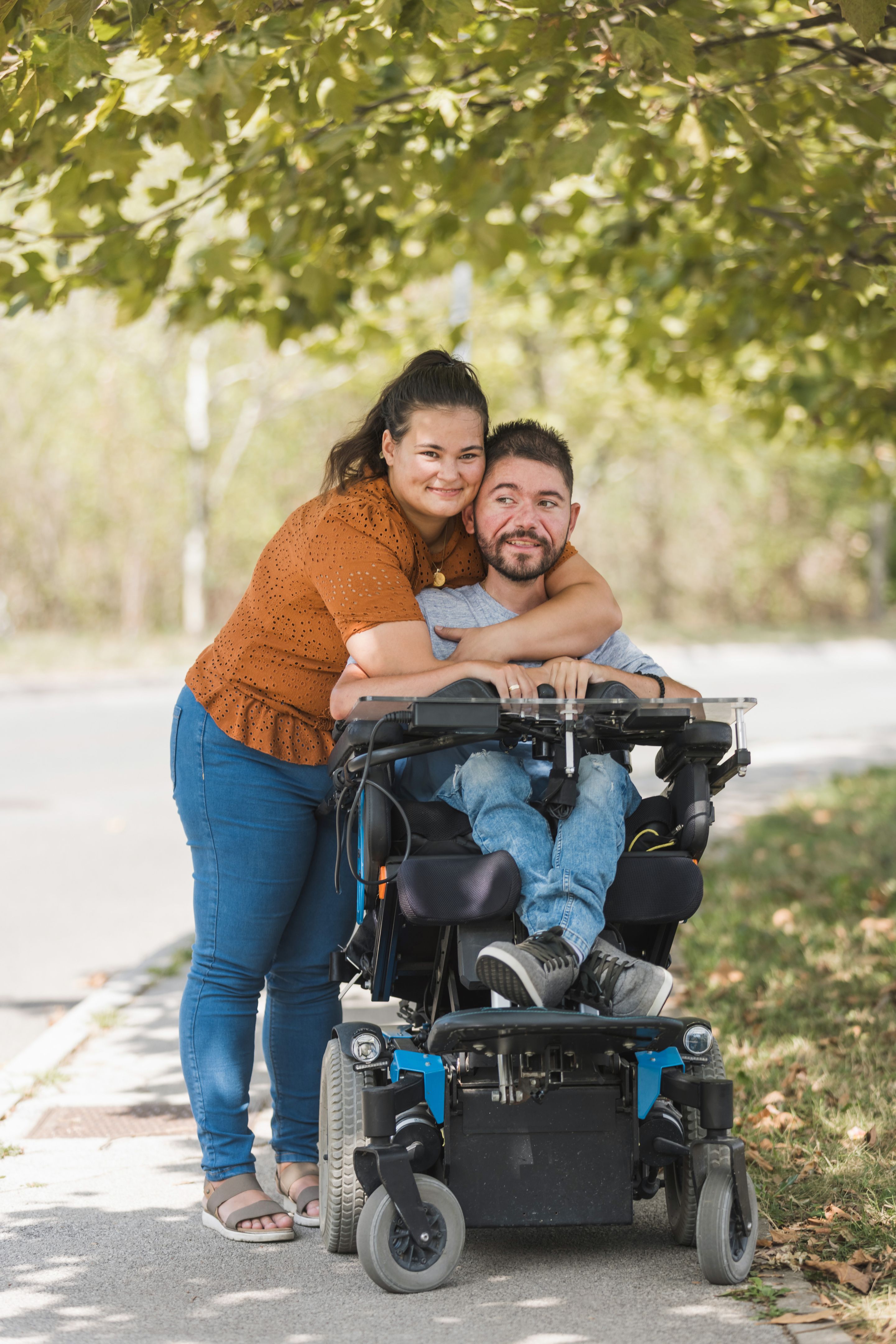 Gentle touch of married couple hands, man with disability and his wife