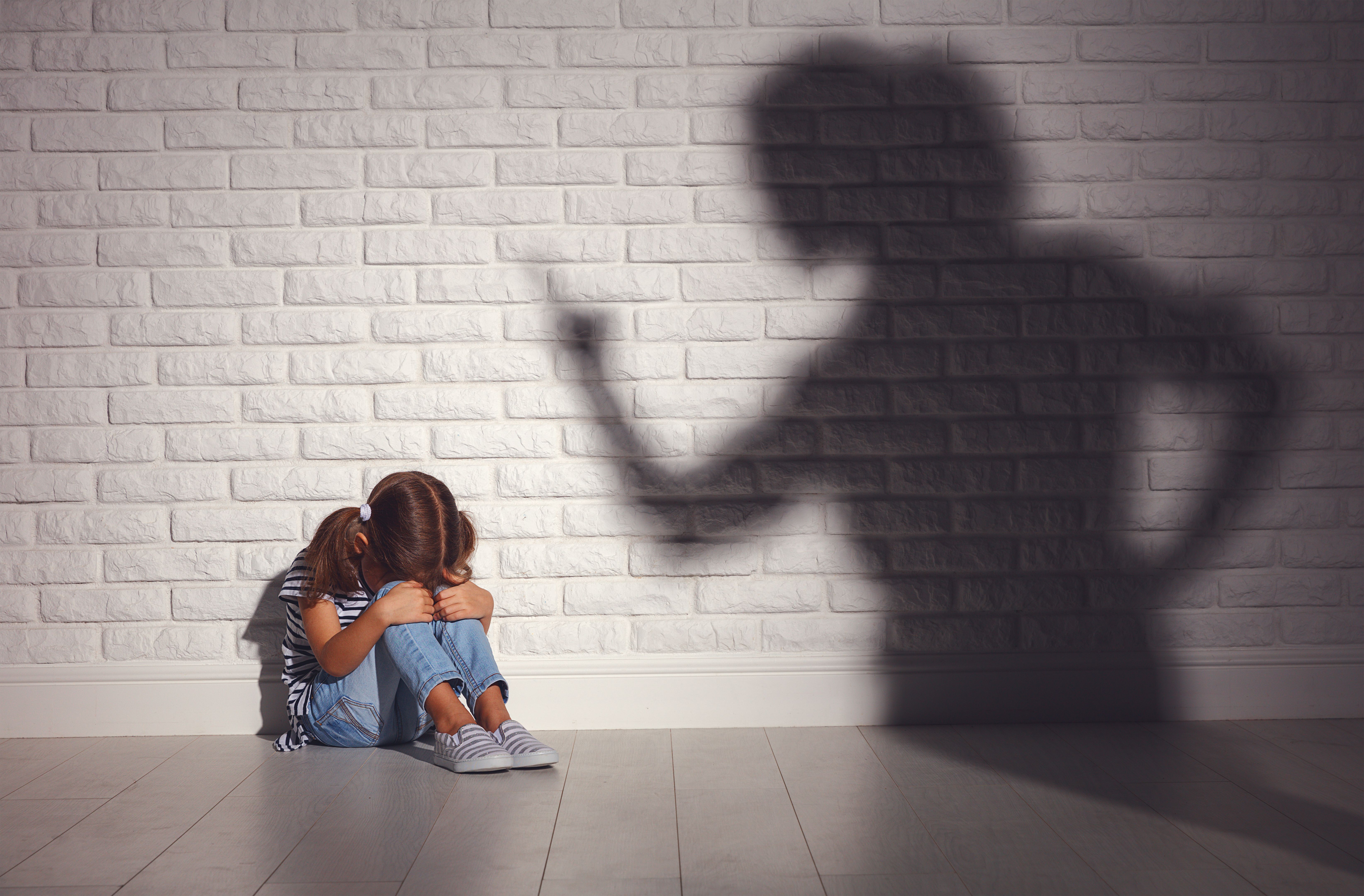 domestic violence. angry mother scolds frightened daughter domestic violence. angry mother scolds frightened daughter