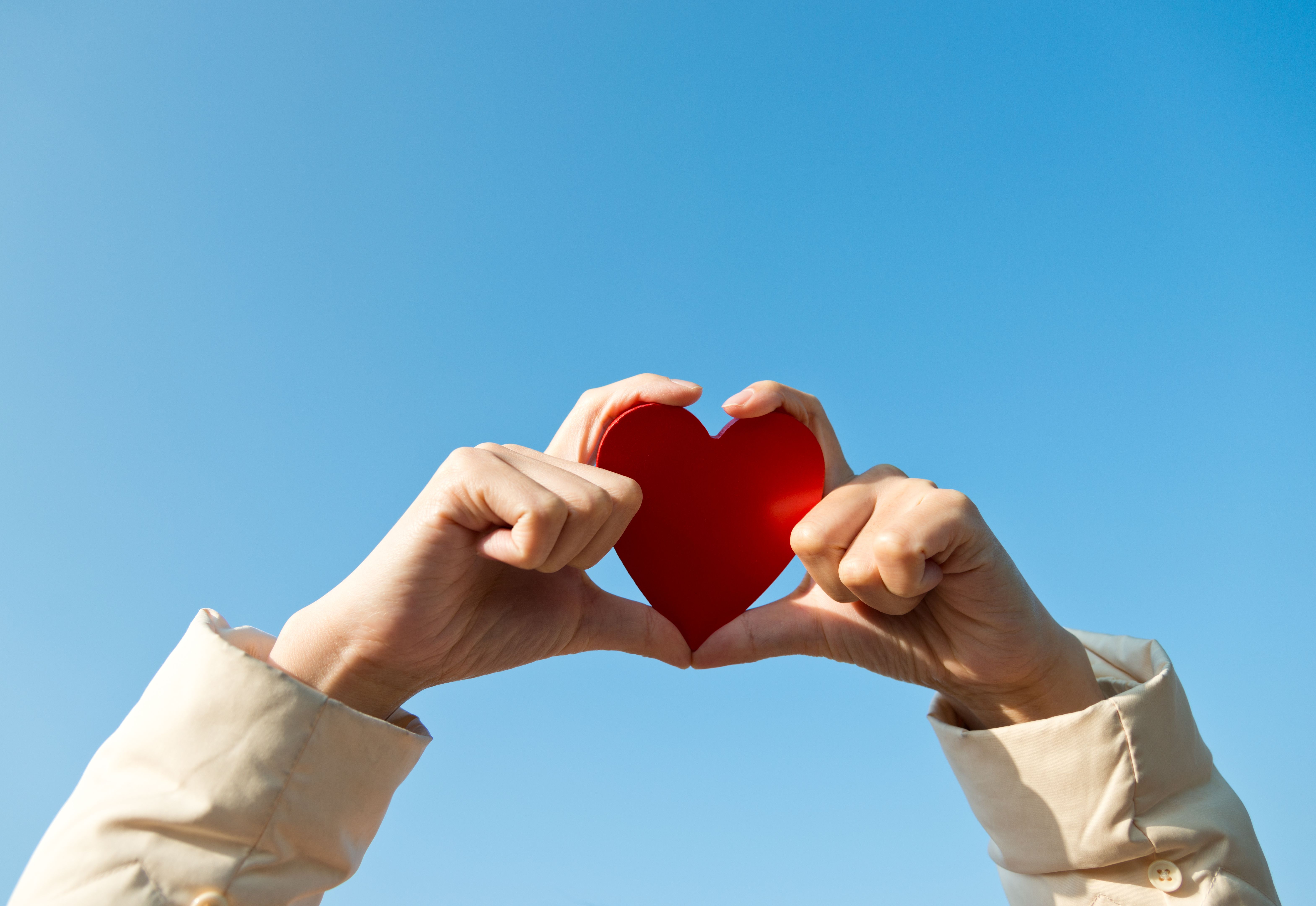 holding a red heart