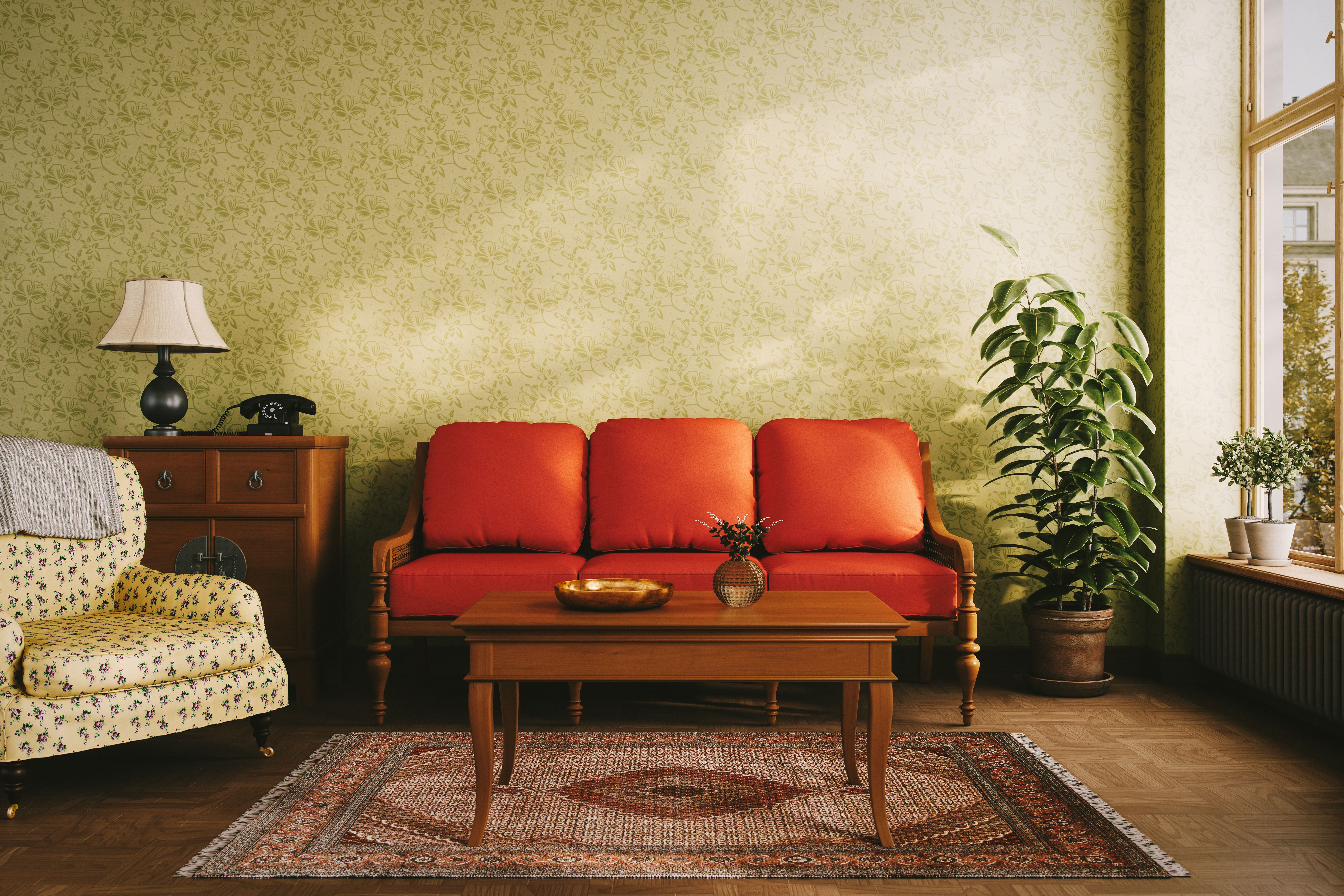 Cozy Vintage Living Room with Red Sofa and Armchair