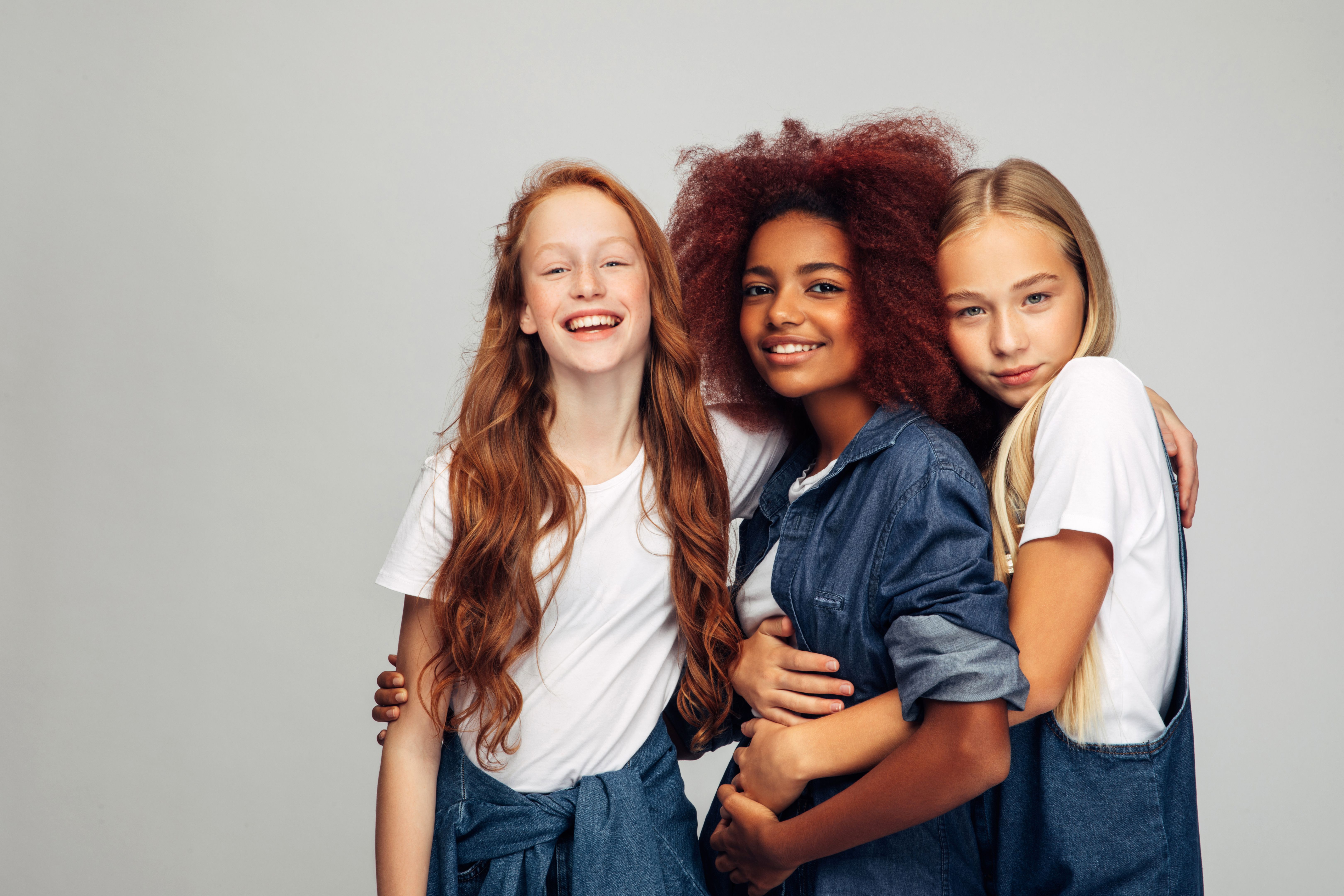 Three young and happy teenage girls