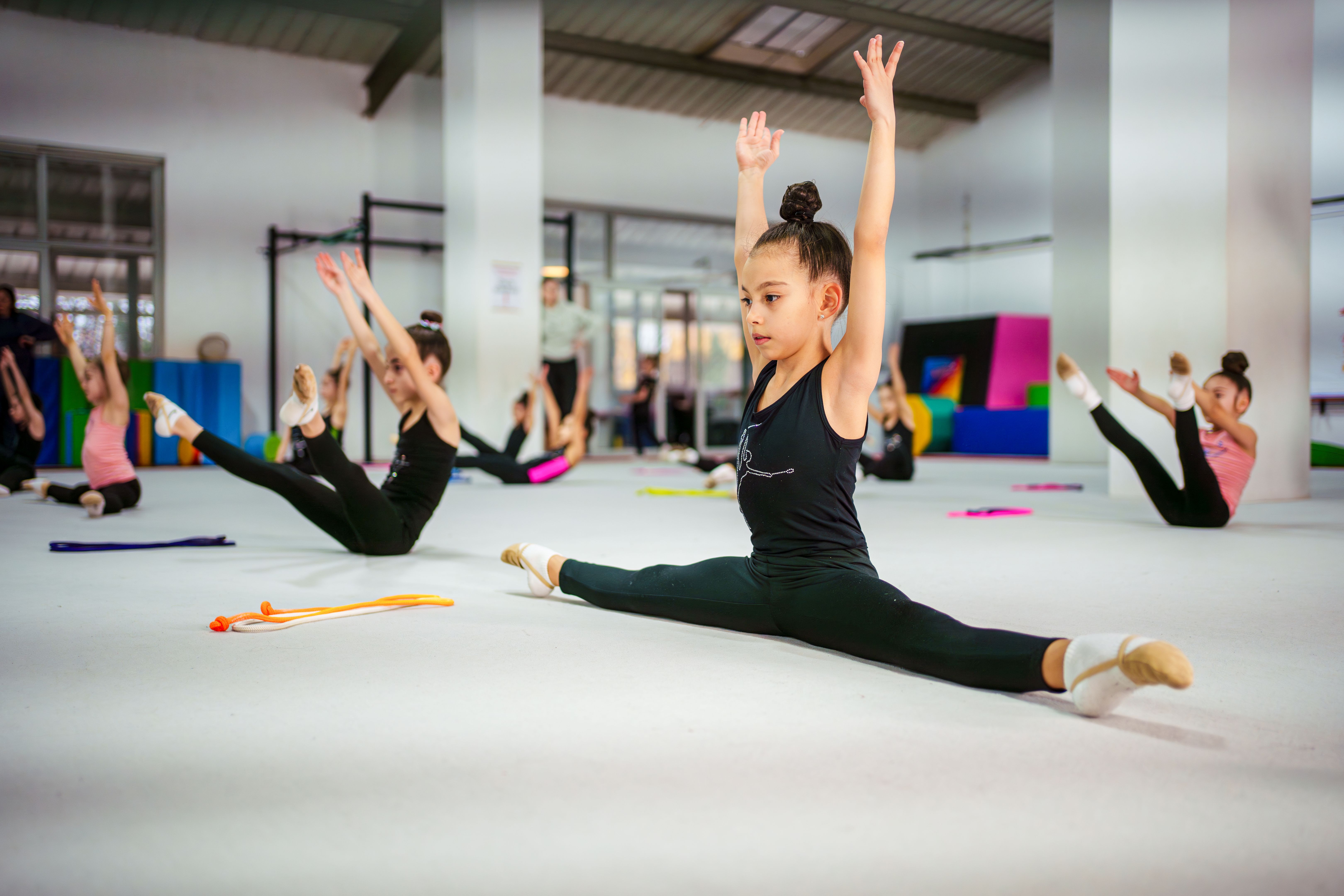 children practicing pilates