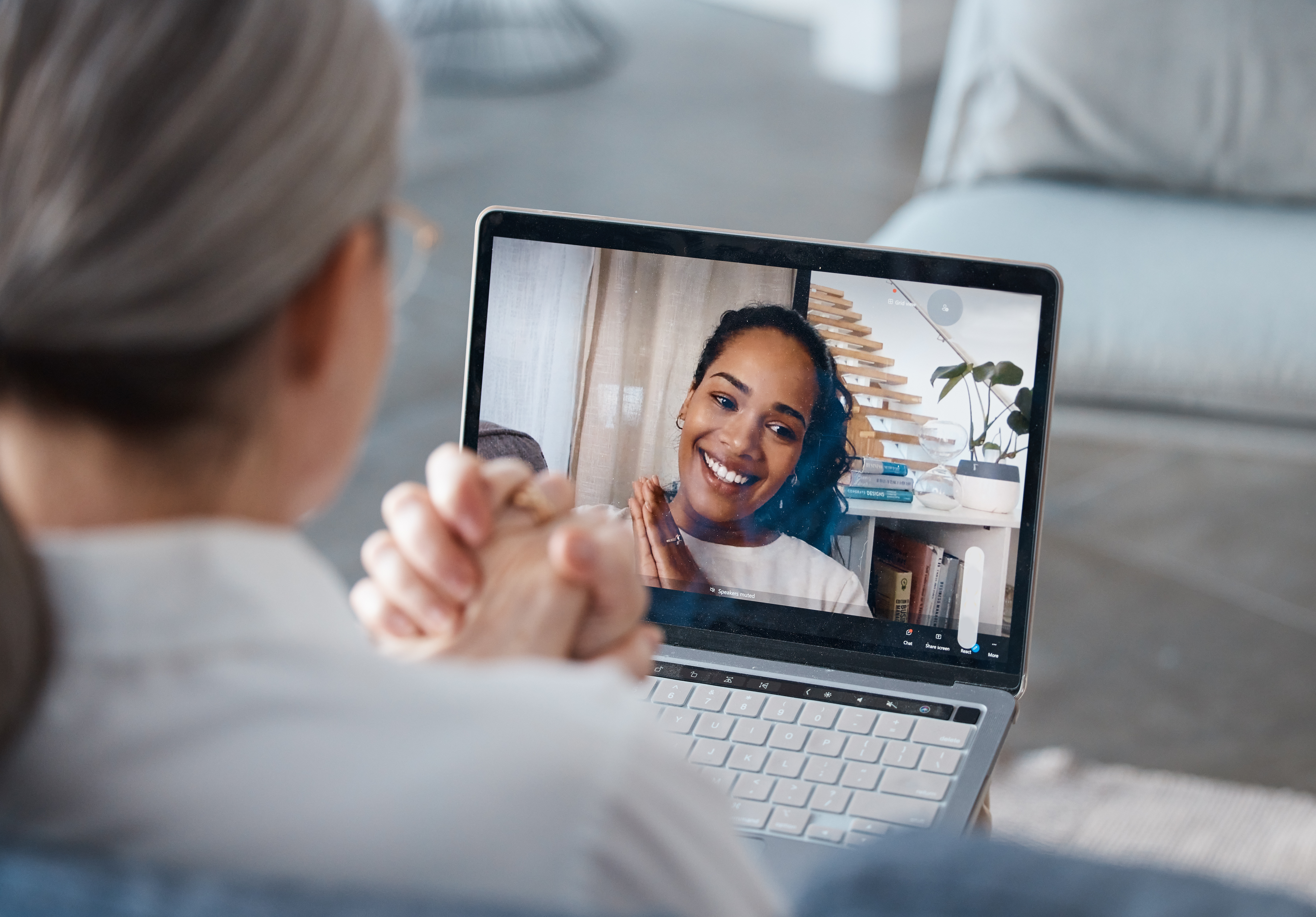 Shot of an unrecognisable psychologist sitting and using a laptop for an online consultation with her patient