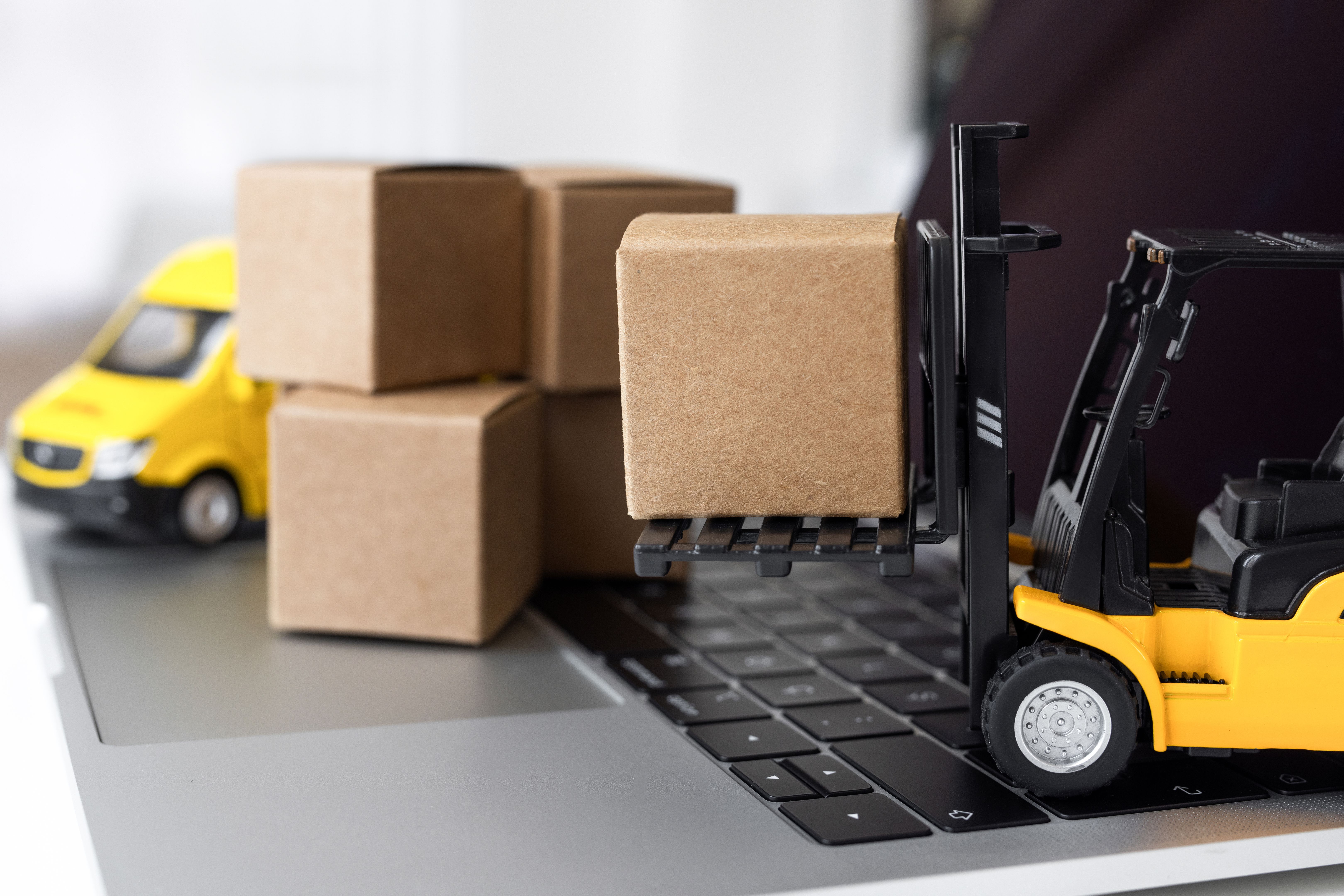 Fork-lift moves boxes