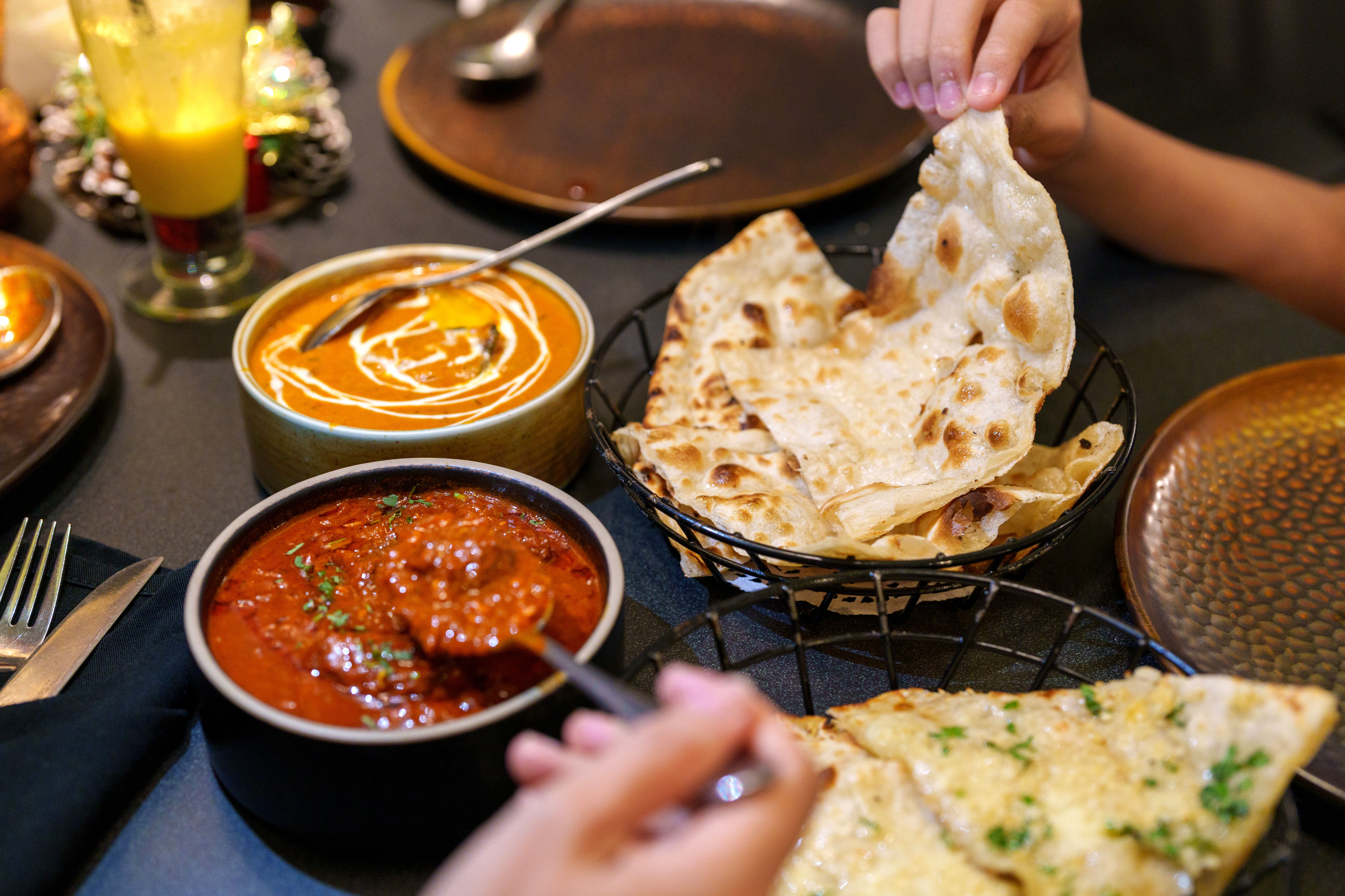 Indian Cuisine, Butter Chicken and Naan Indian Cuisine, Butter Chicken and Naan