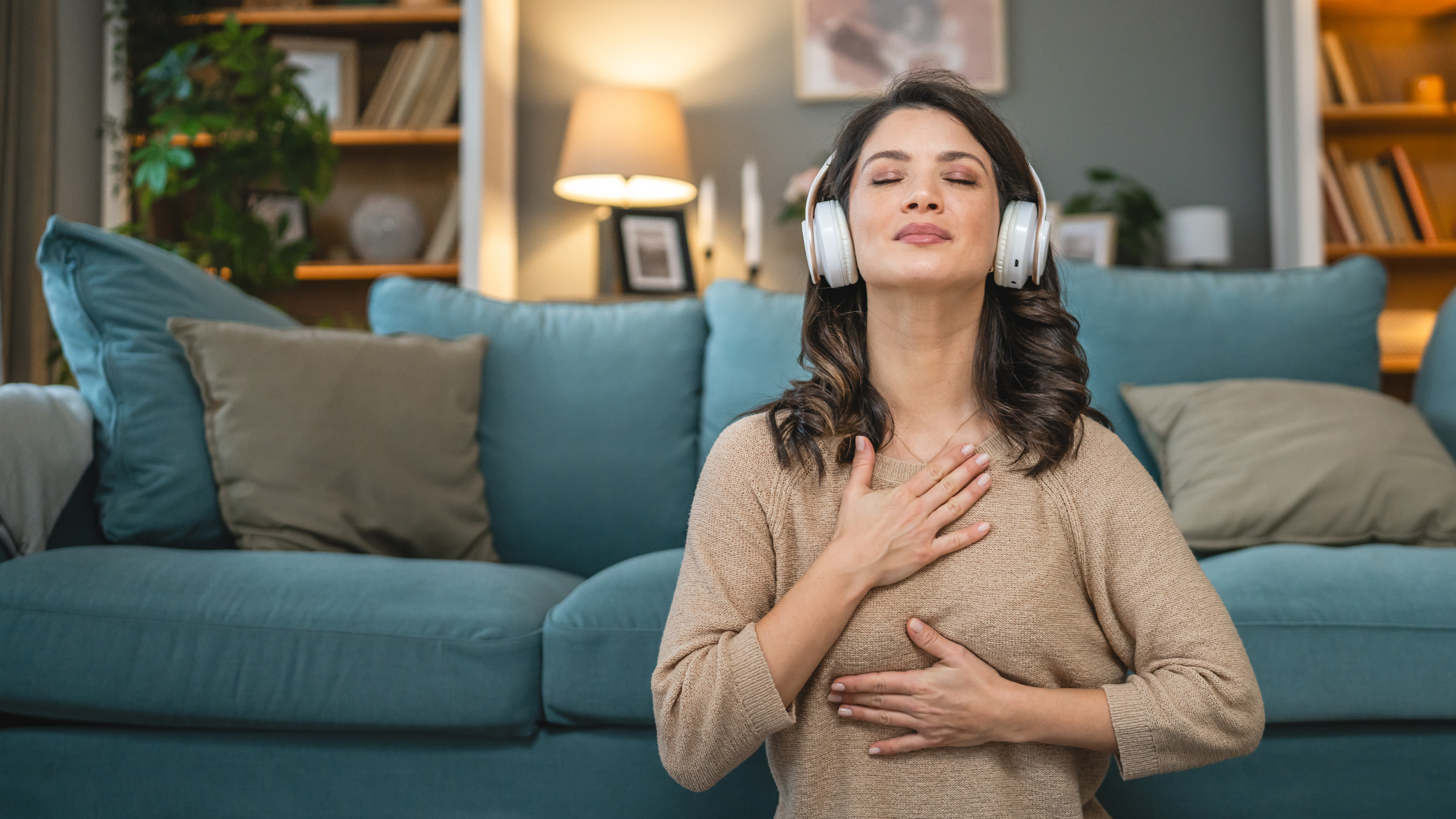adult woman practice guided yoga meditation at home