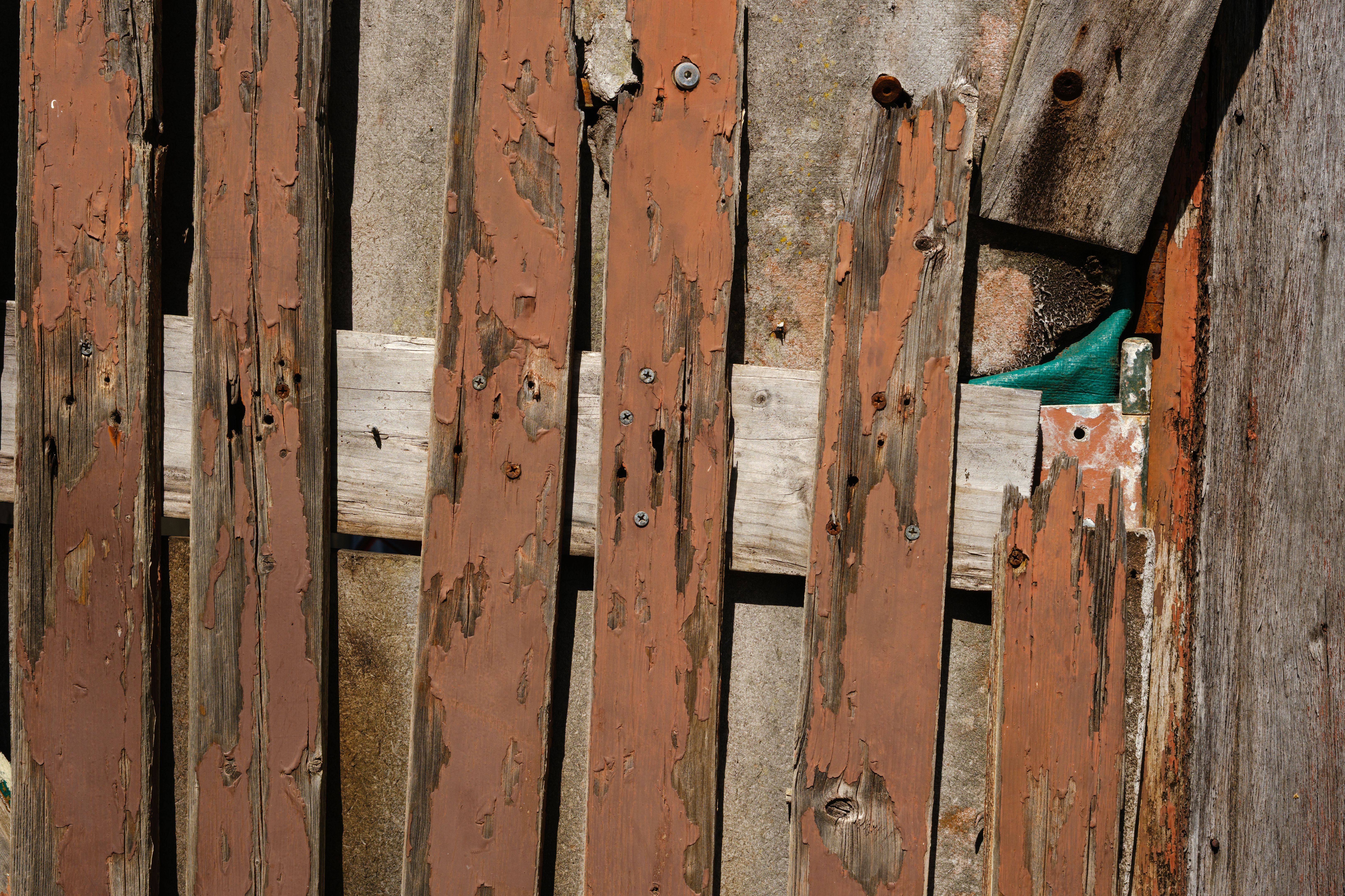 damaged wood fence