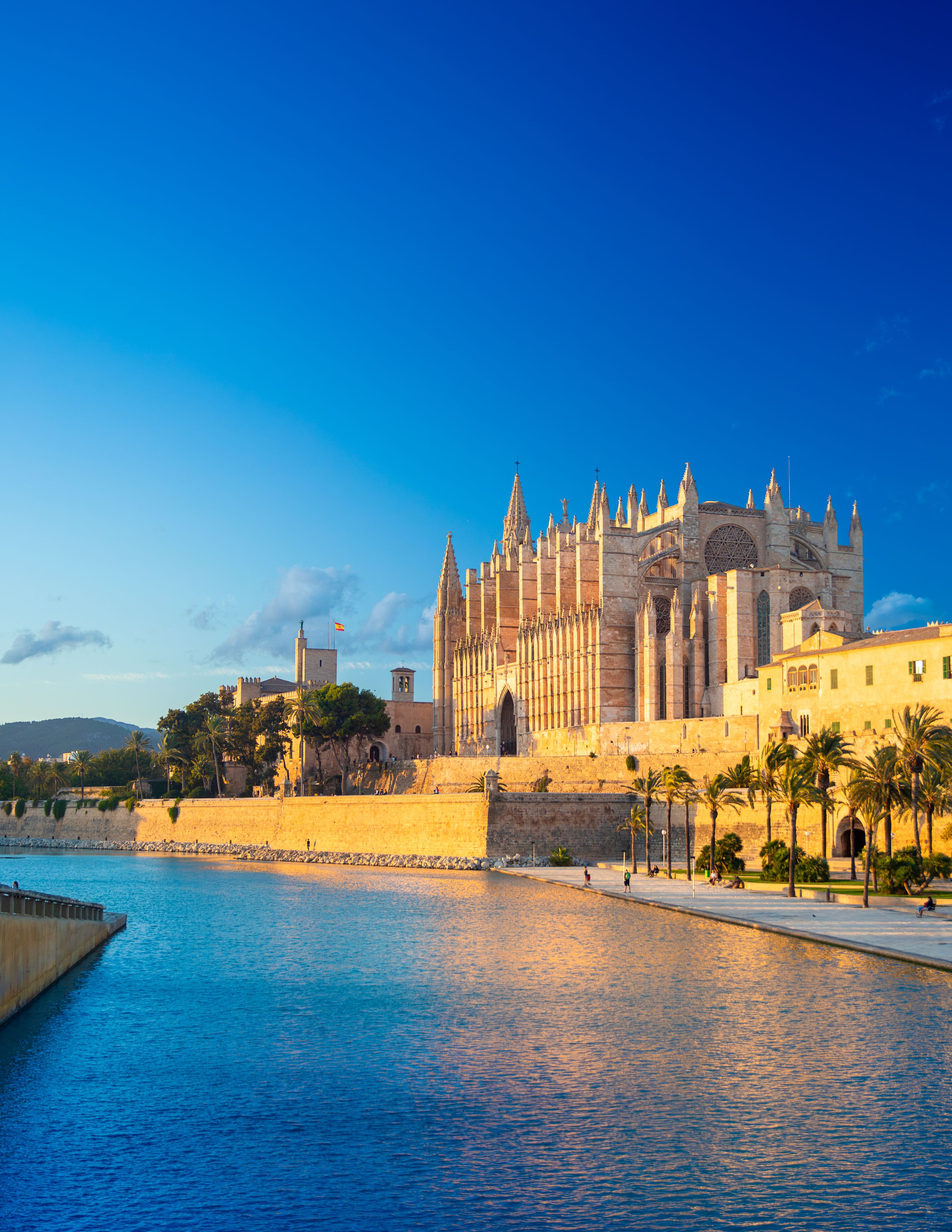 The Cathedral of Santa Maria of Palma and Parc del Mar near, Majorca, Spain The Cathedral of Santa Maria of Palma and Parc del Mar near, Majorca, Spain