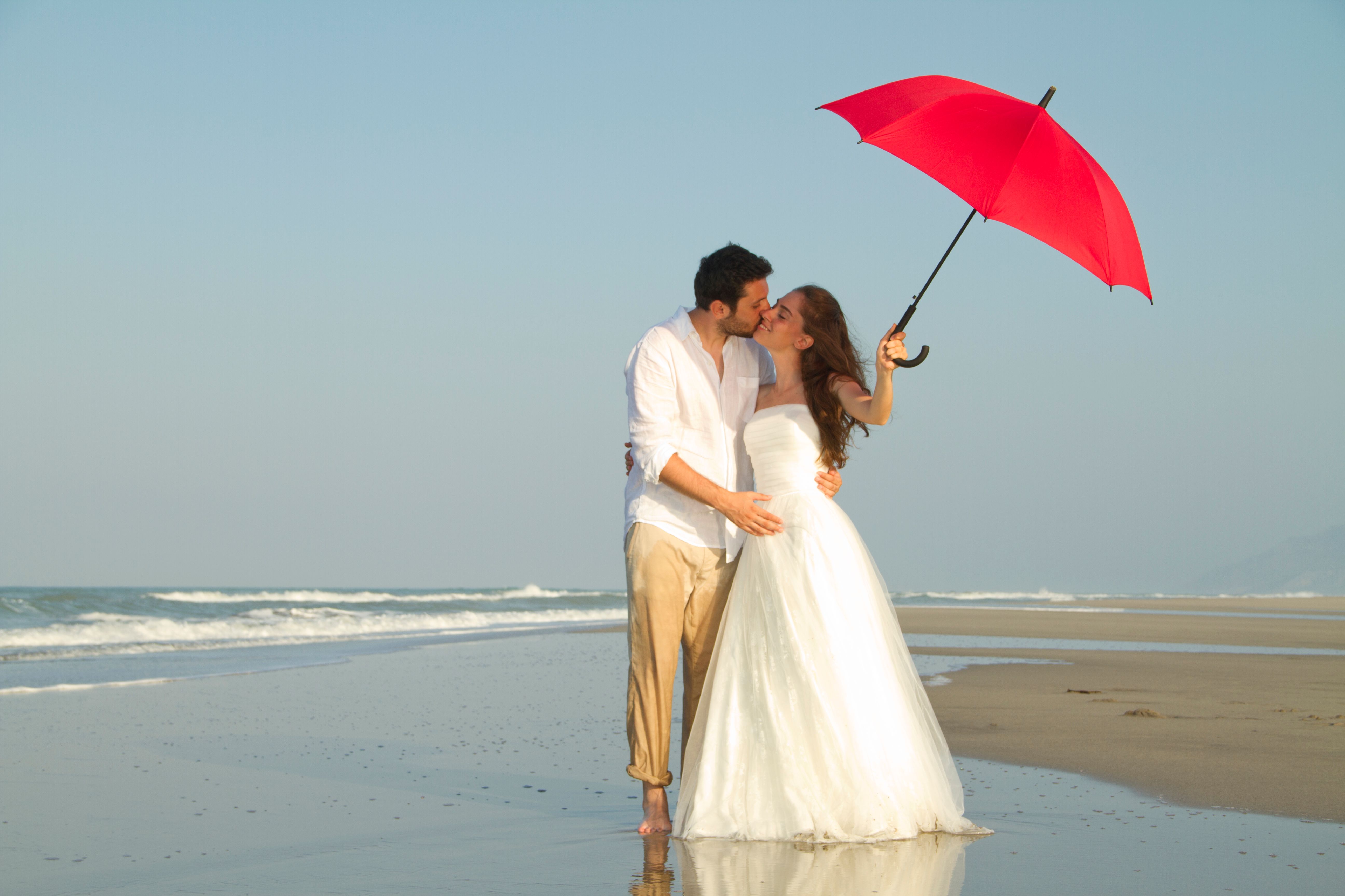Bride and groom at beach Bride and groom at beach