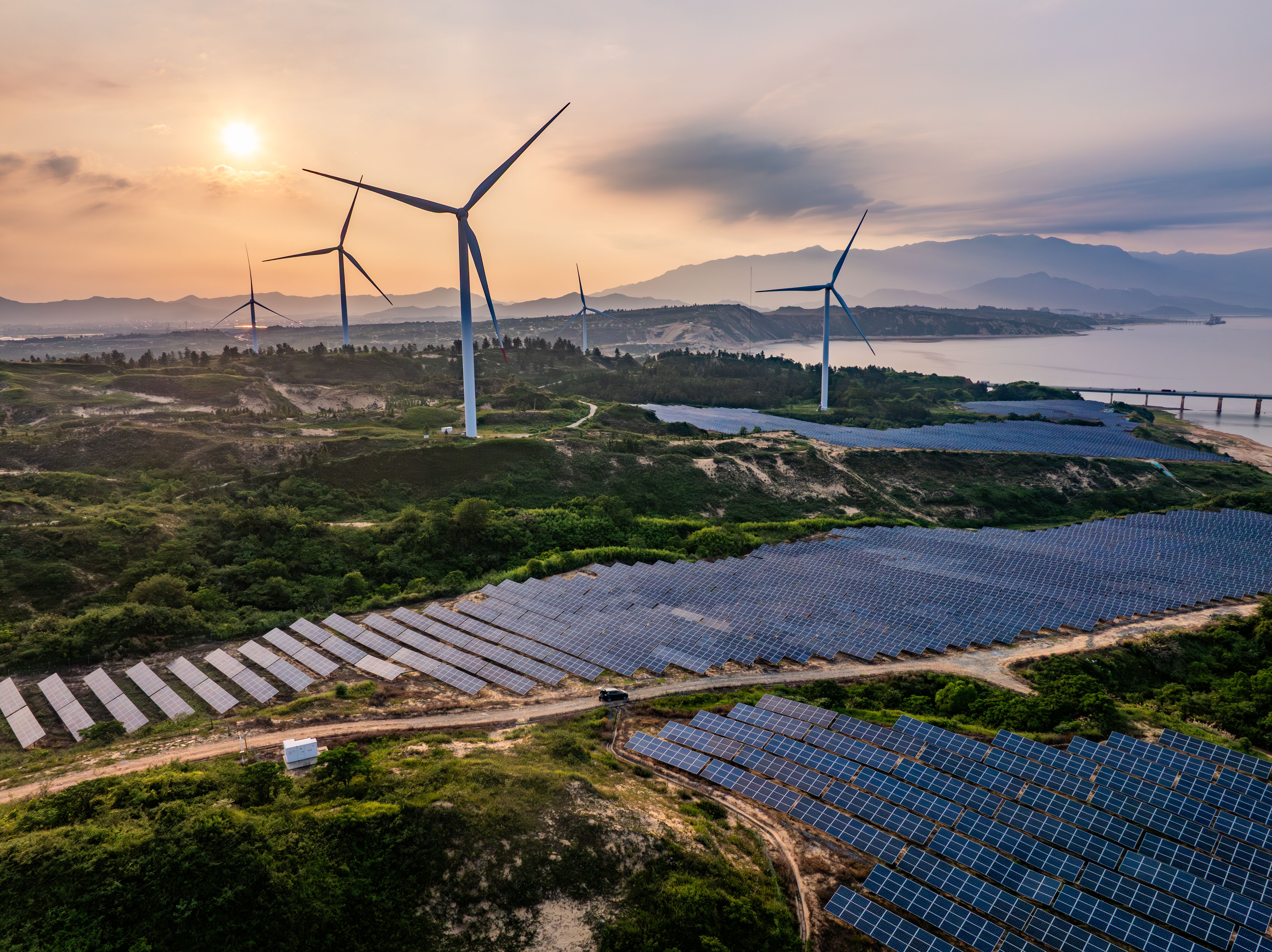 Photovoltaic solar energy wind power new energy at sunset