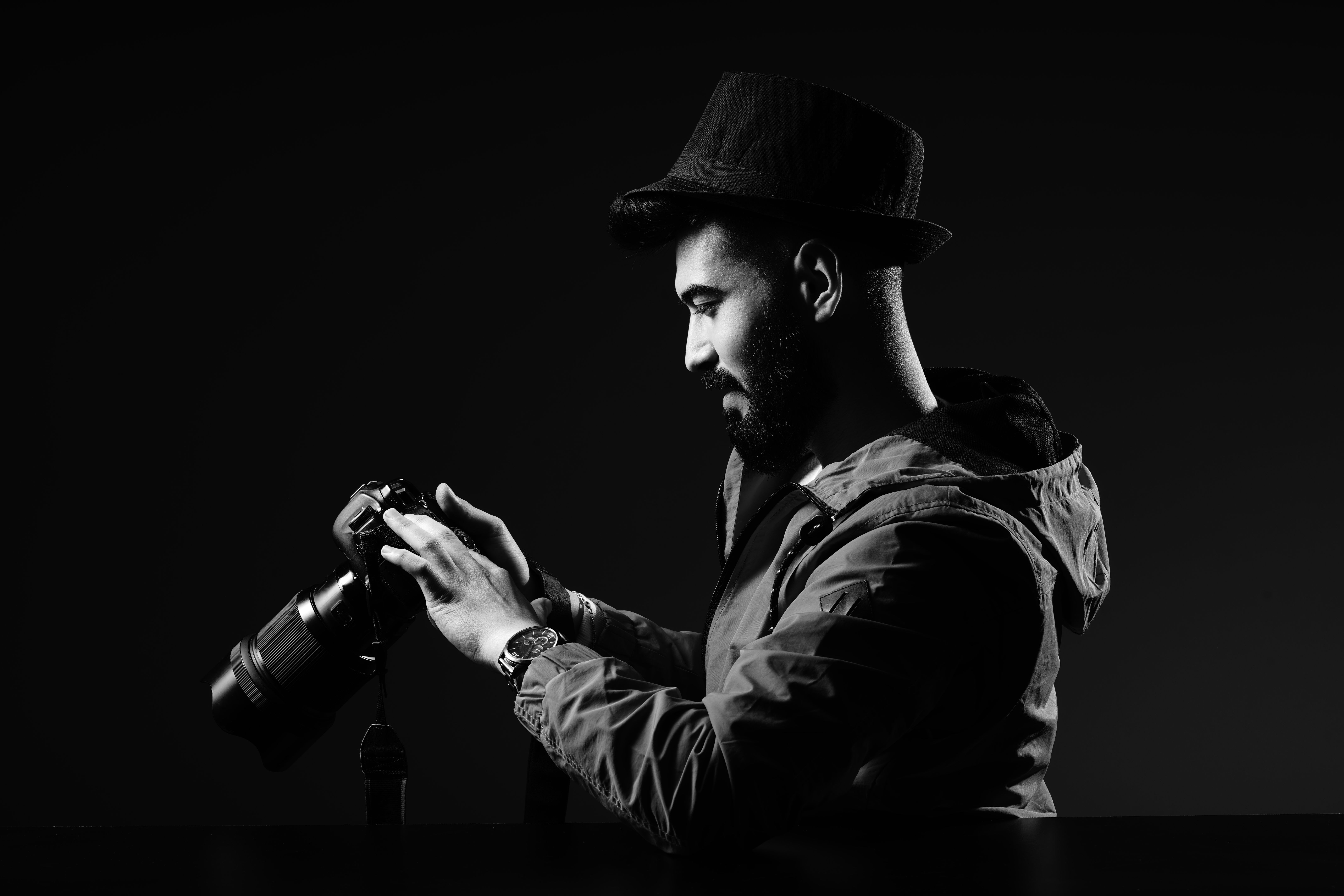 Portrait of a photographer with camera in front of her