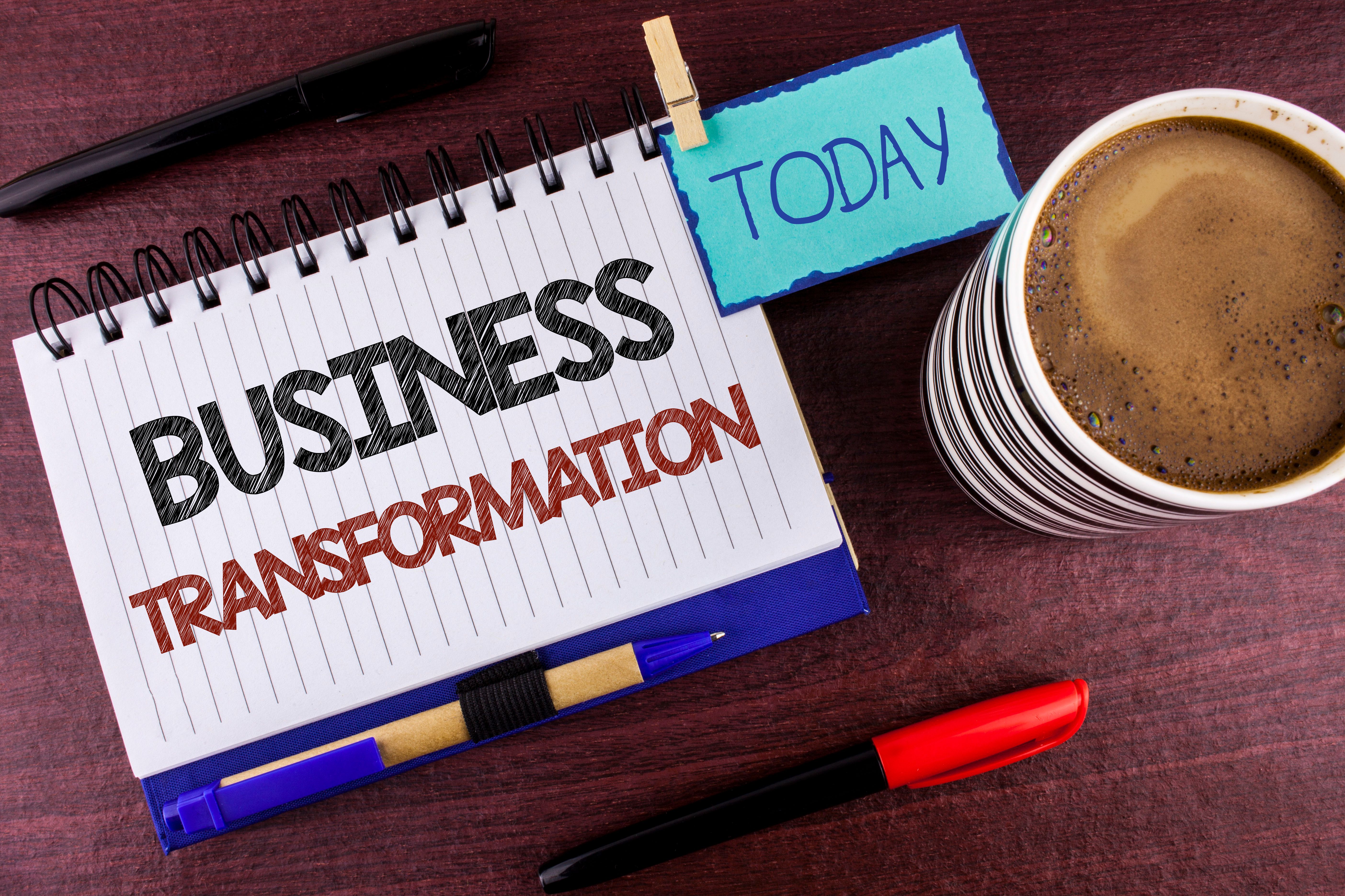 Word writing text Business Transformation. Business concept for Making changes in conduction of the company Upgrade written on Notepad on wooden background Today Clip Pen Marker Coffee Cup Word writing text Business Transformation. Business concept for Making changes in conduction of the company Upgrade written on Notepad on wooden background Today Clip Pen Marker Coffee Cup