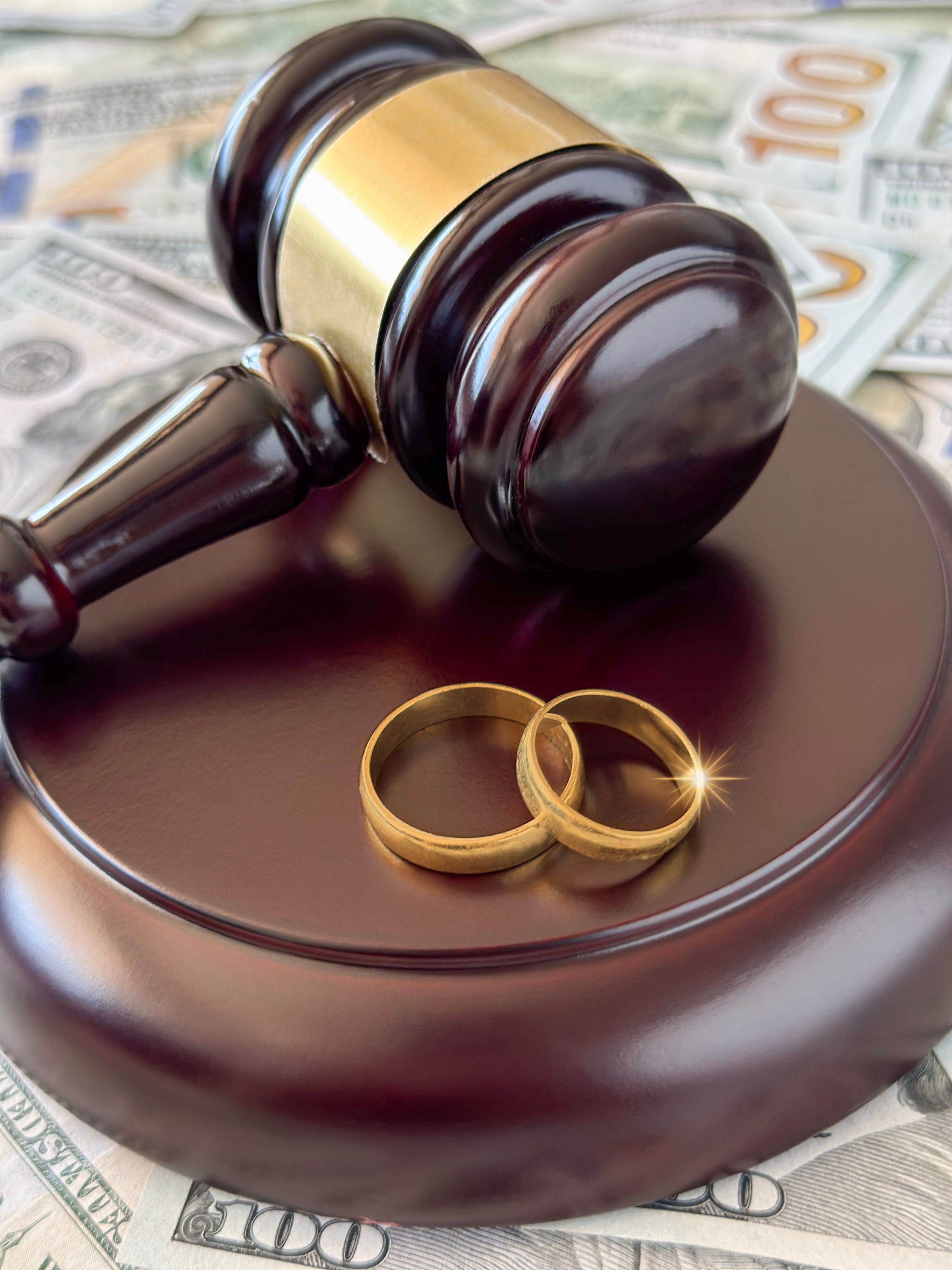 Judge gavel and wedding rings