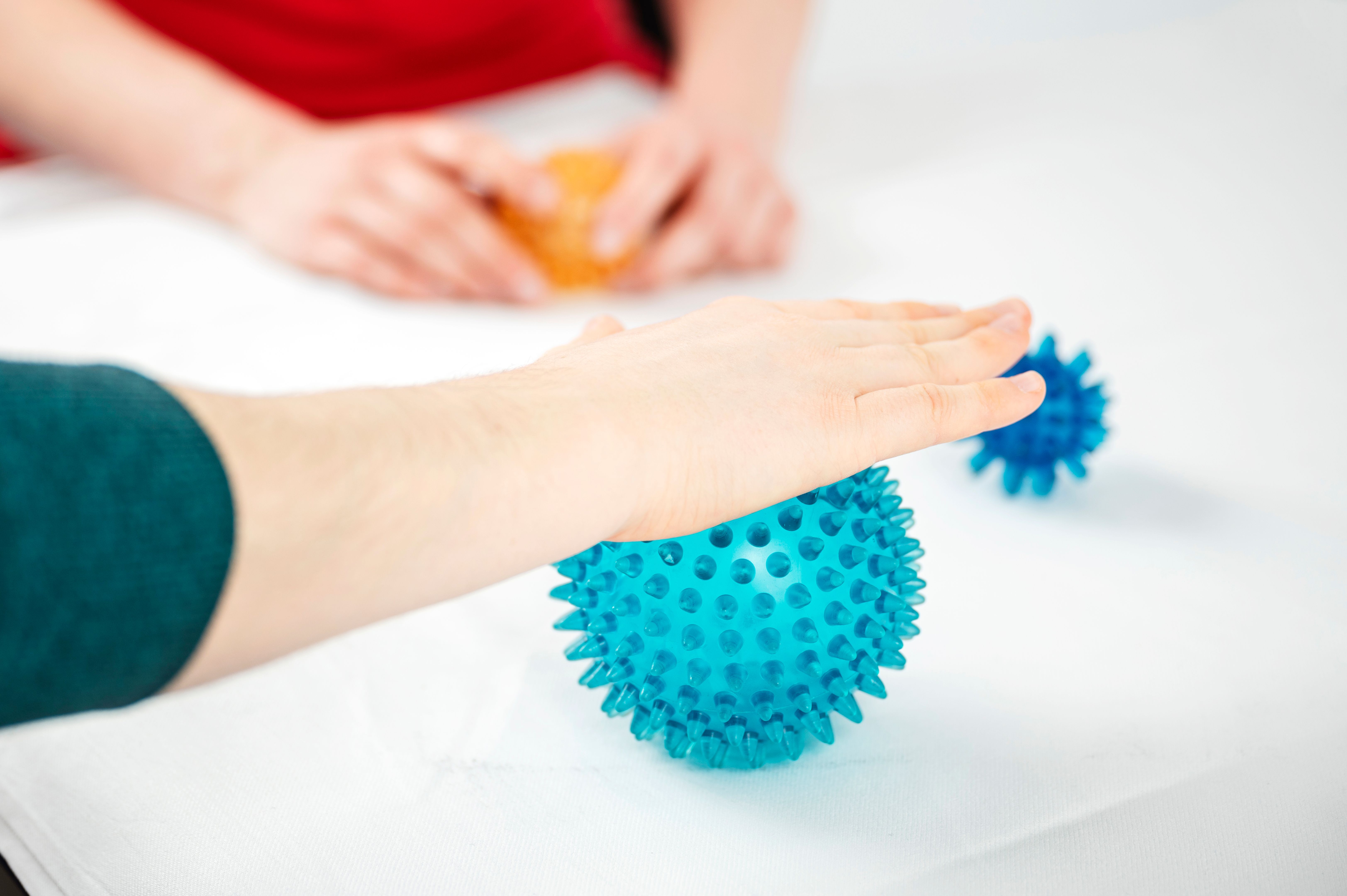 Physiotherapy treatment with hedgehog ball