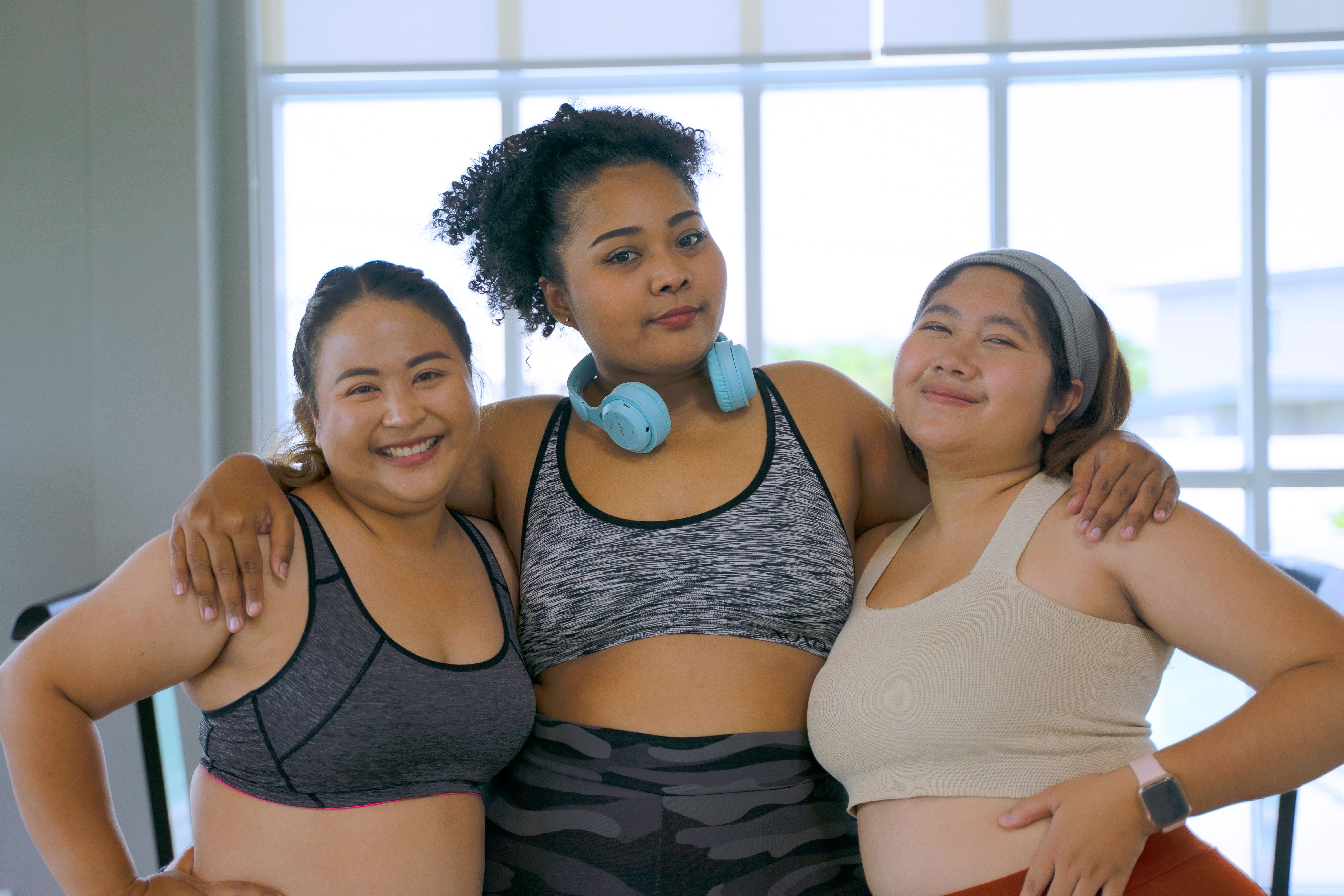 chubby women workout at fitness center. chubby women workout at fitness center.