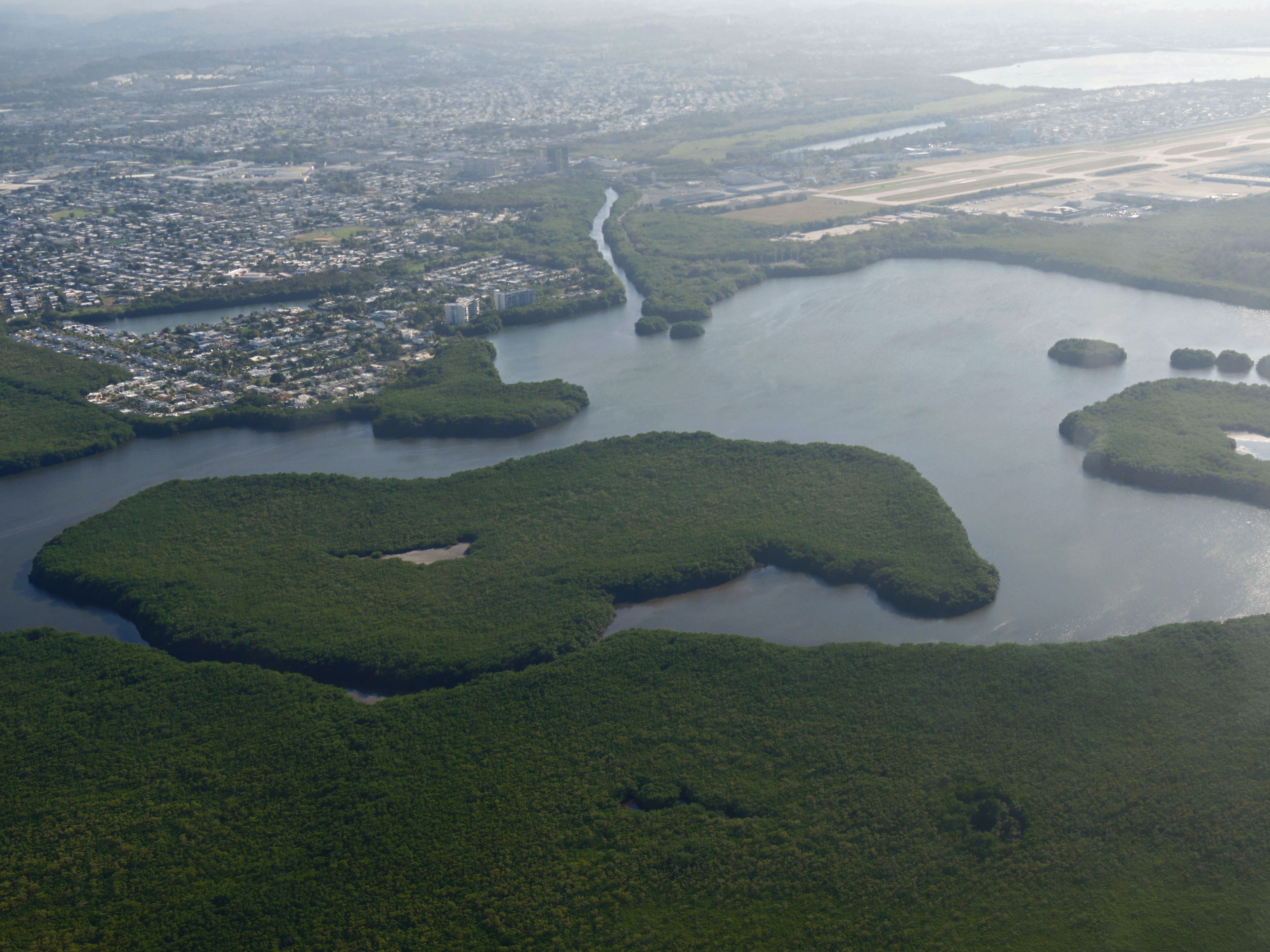Aerial view of islands and swamps at Puerto Rico, seen from an airplane window. Aerial view of islands and swamps at Puerto Rico, seen from an airplane window.