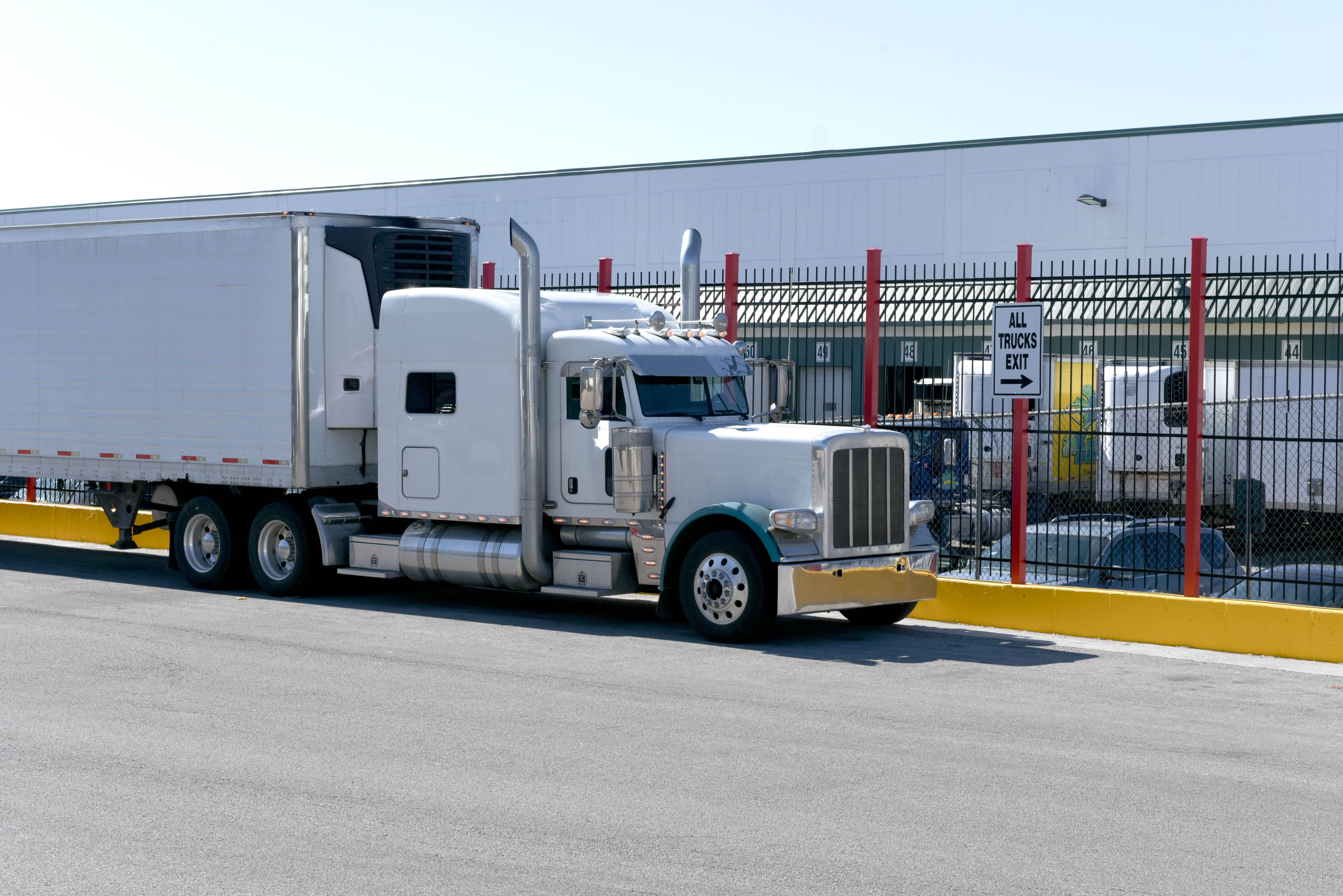 Classic American Truck Parked By Exit Sign After Unloading