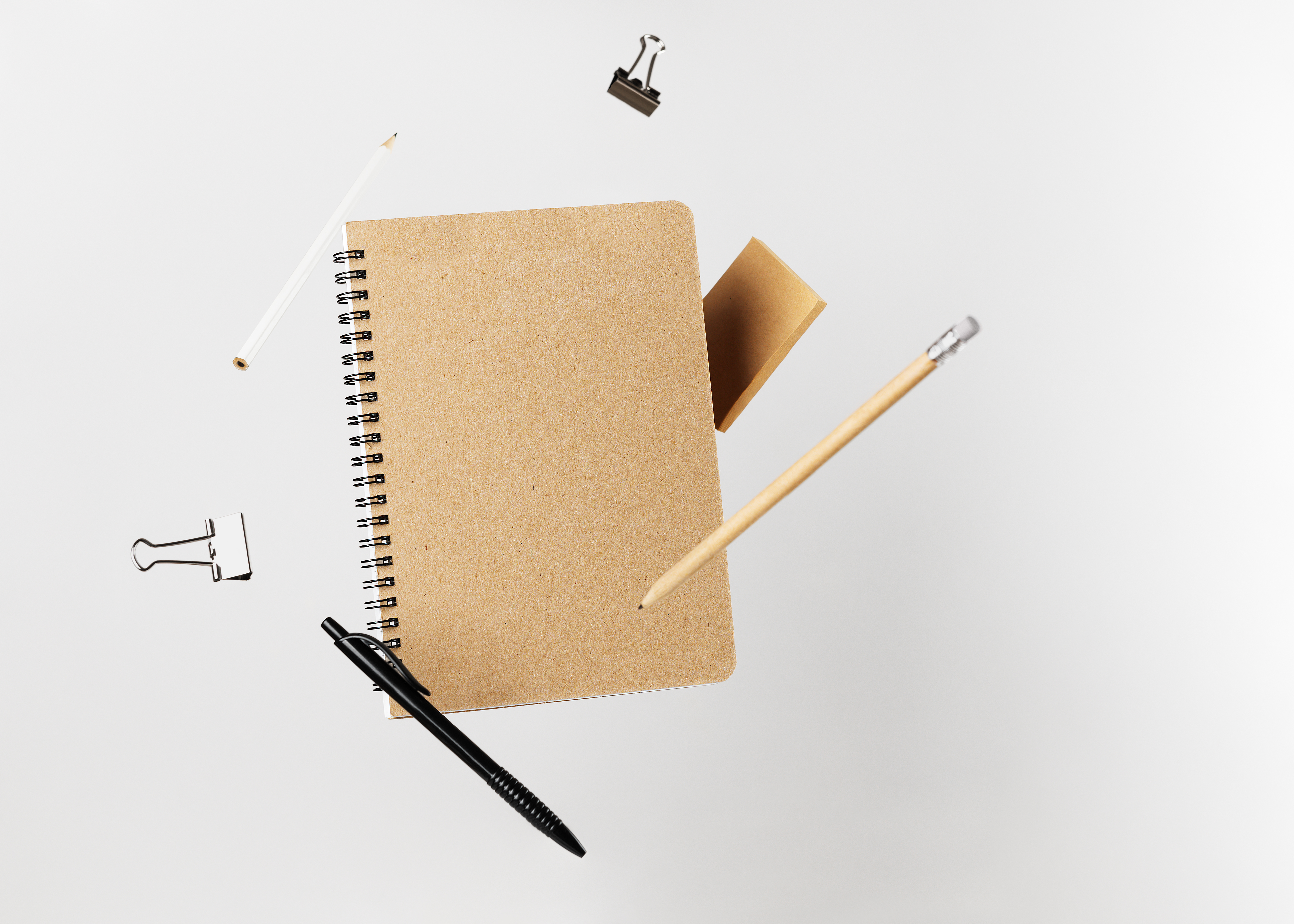 Stationery set with notepad, pencils, pen and binder clips