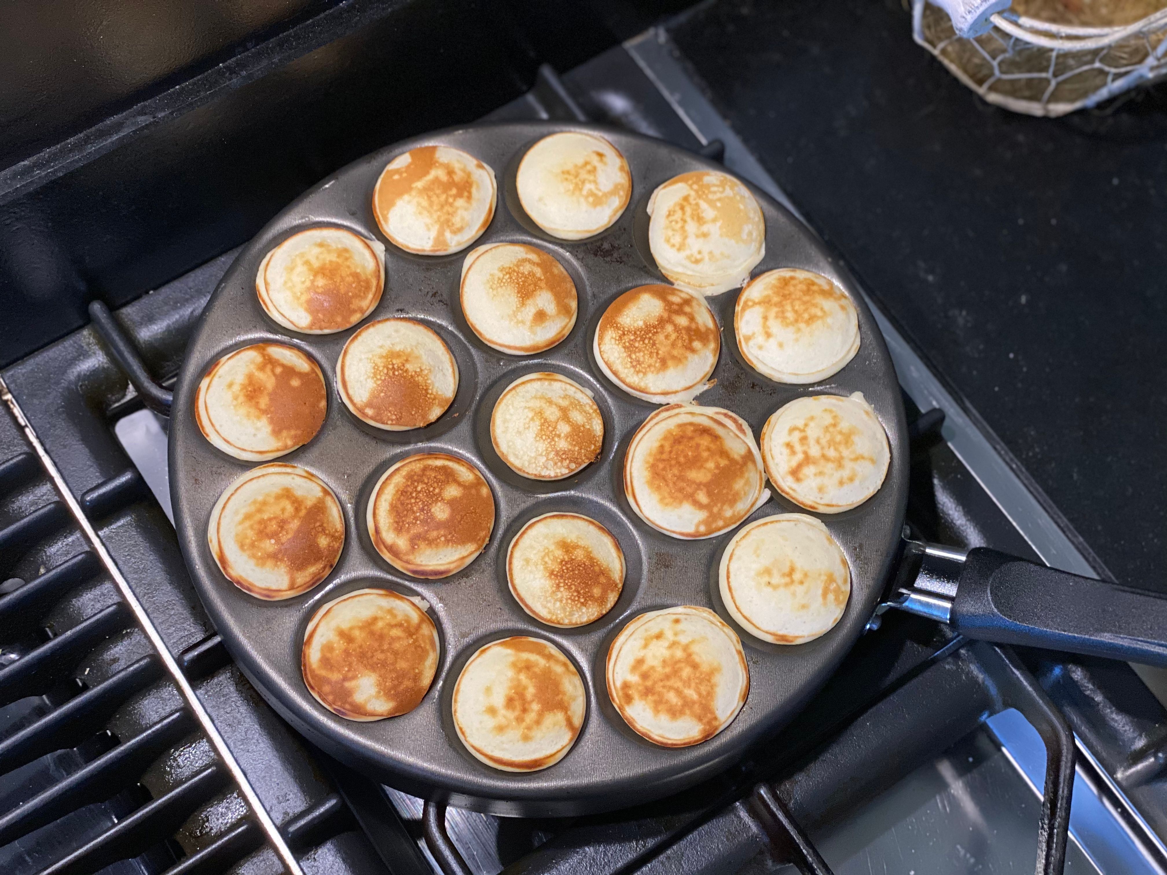 Preparing Dutch poffertjes