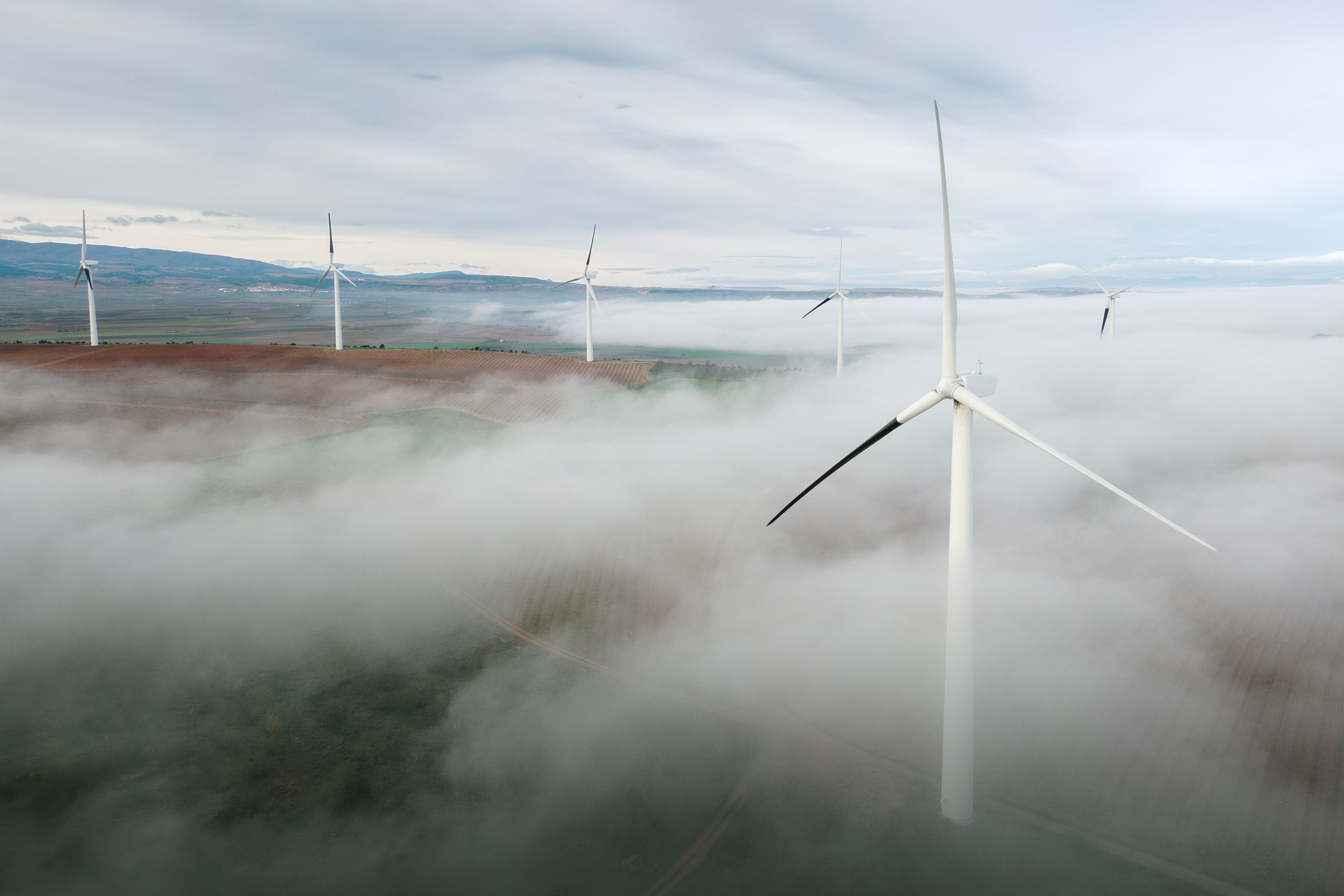 Wind turnines over fog Wind turnines over fog