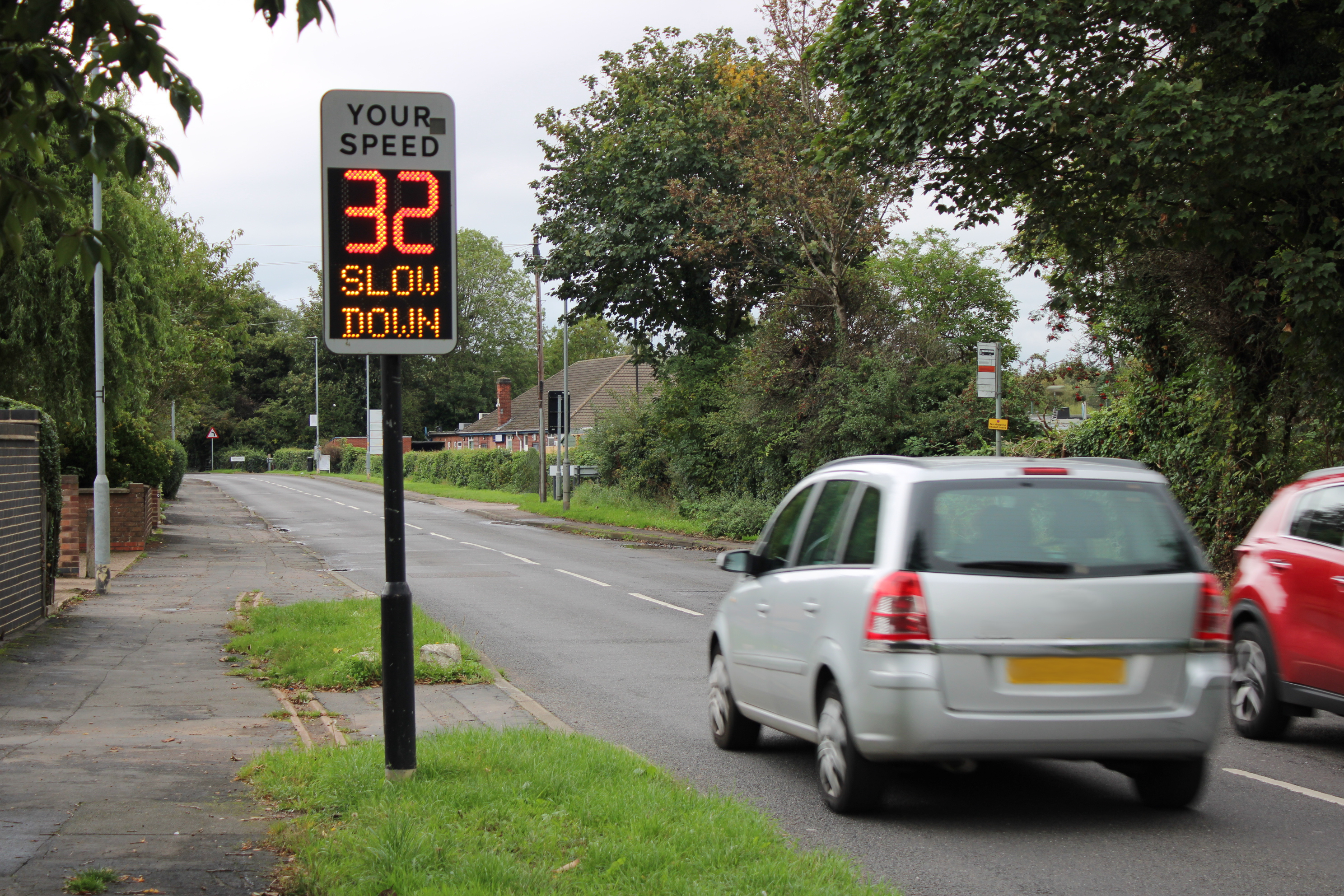 Vehicle activated speed sign showing speed to driver