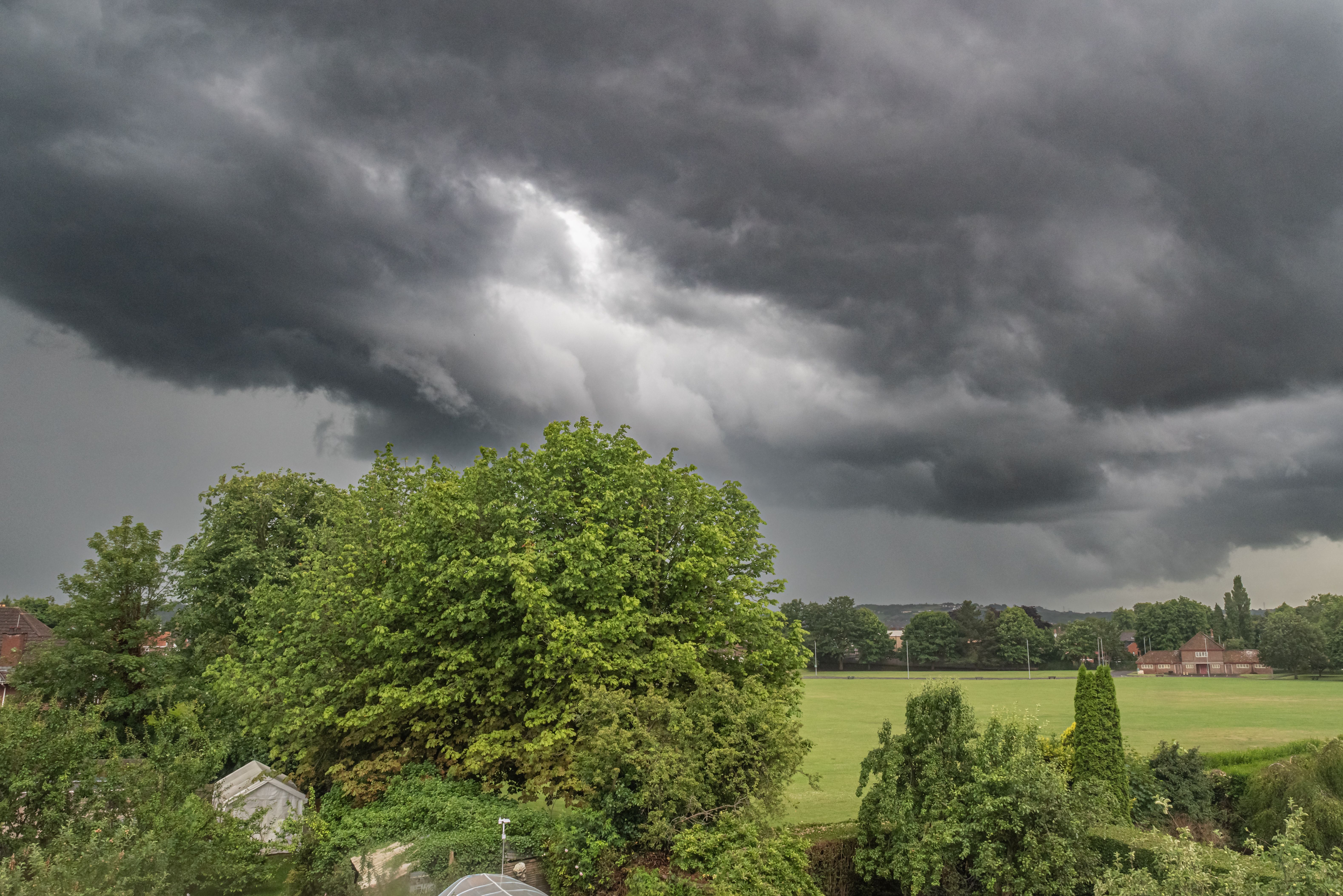 Storm clouds gathering over playing fields Storm clouds gathering over playing fields