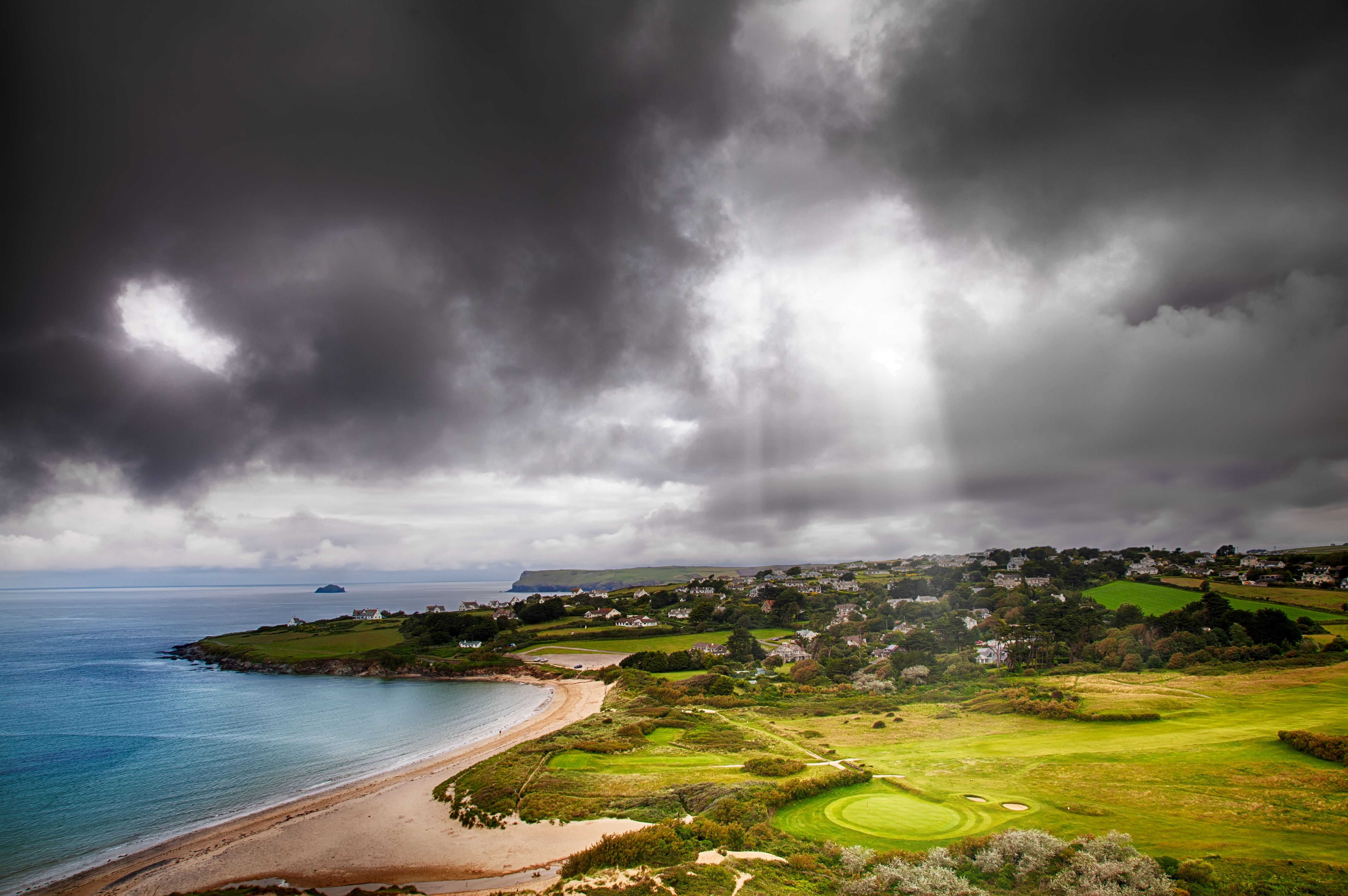 Landscape with light beam onto golf course
