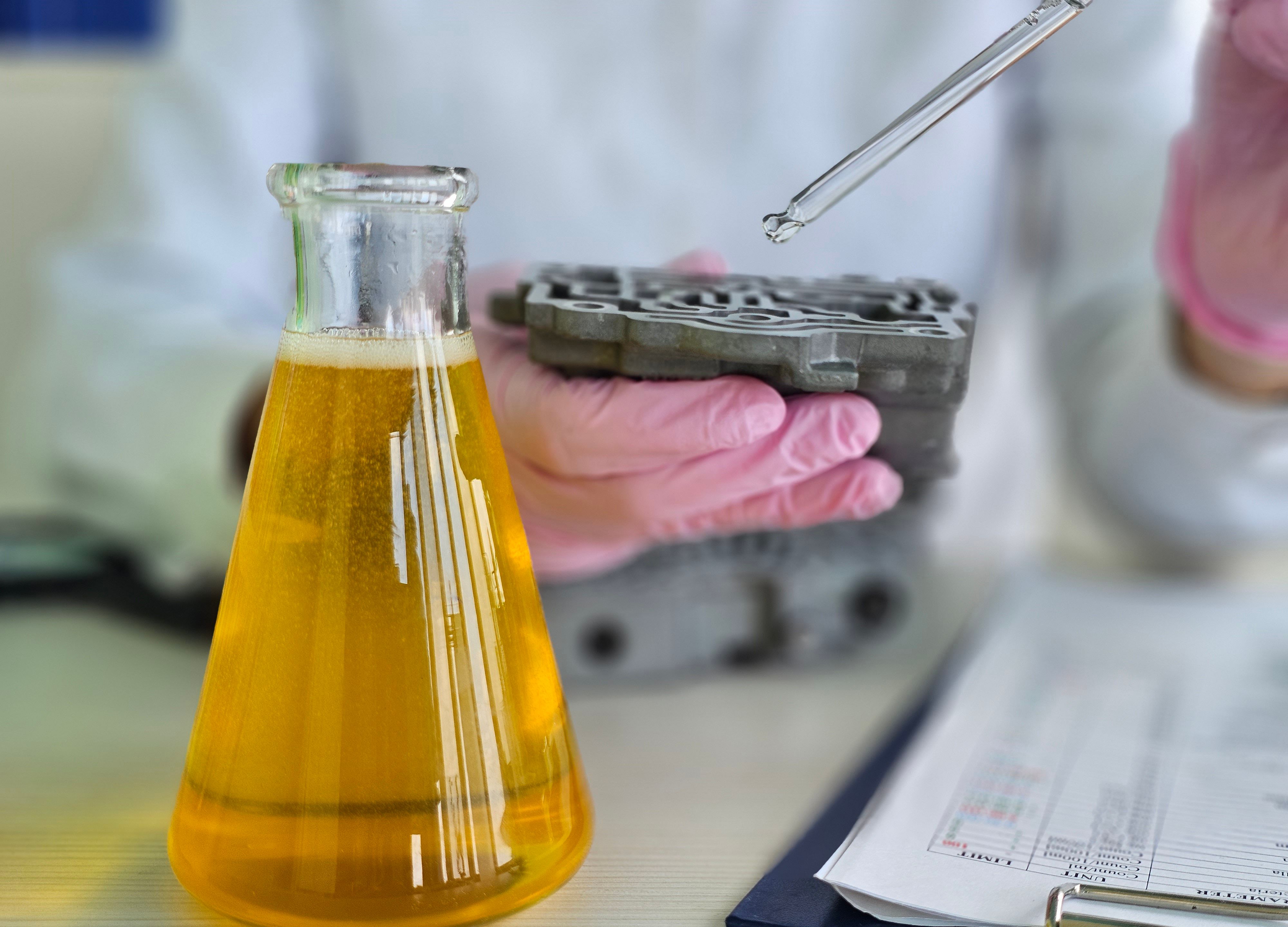 Laboratory technician conducting experiments with liquid samples and chemical materials in a research facility concept