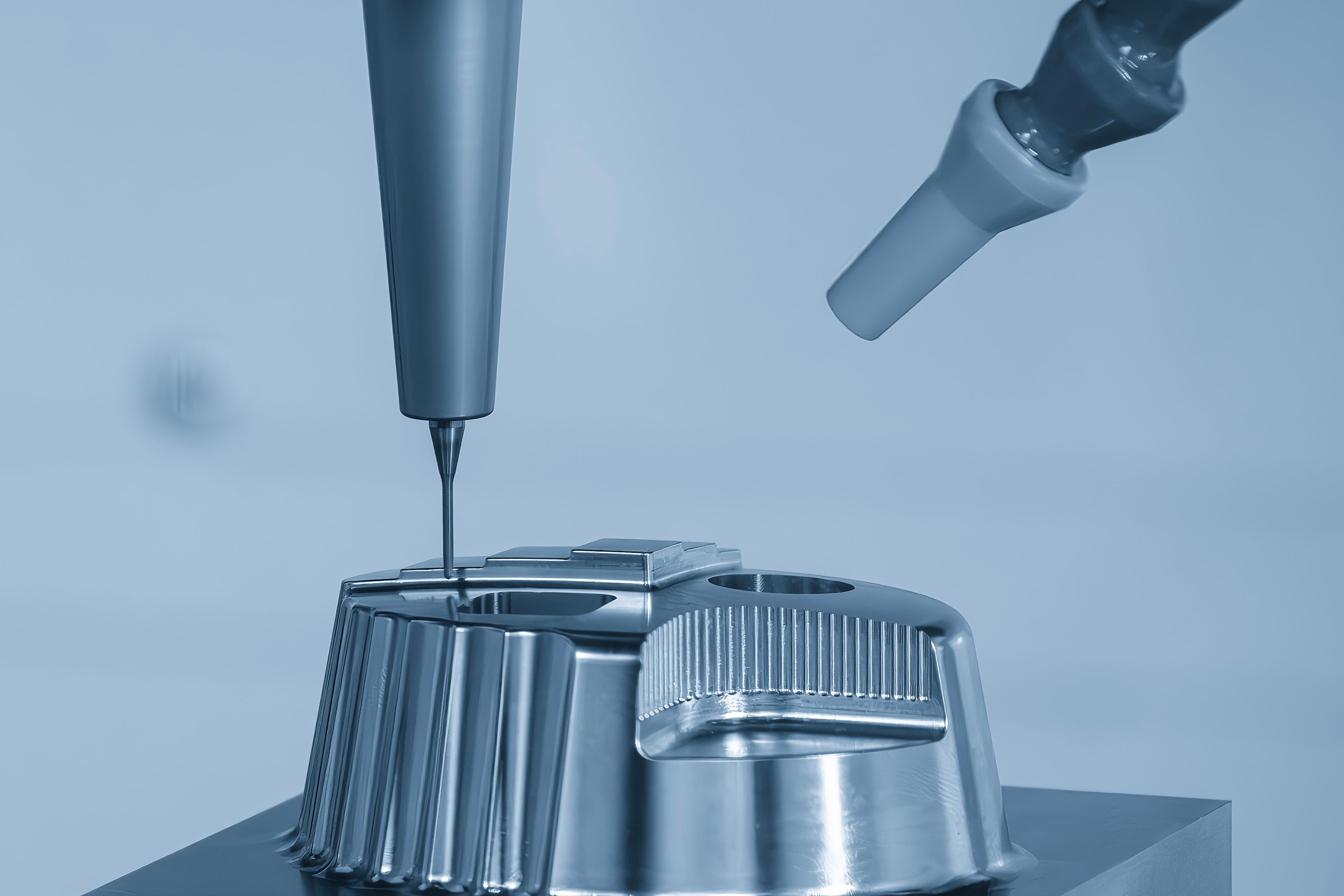 The CNC milling machine cutting  mold part by solid ball end mill tool.