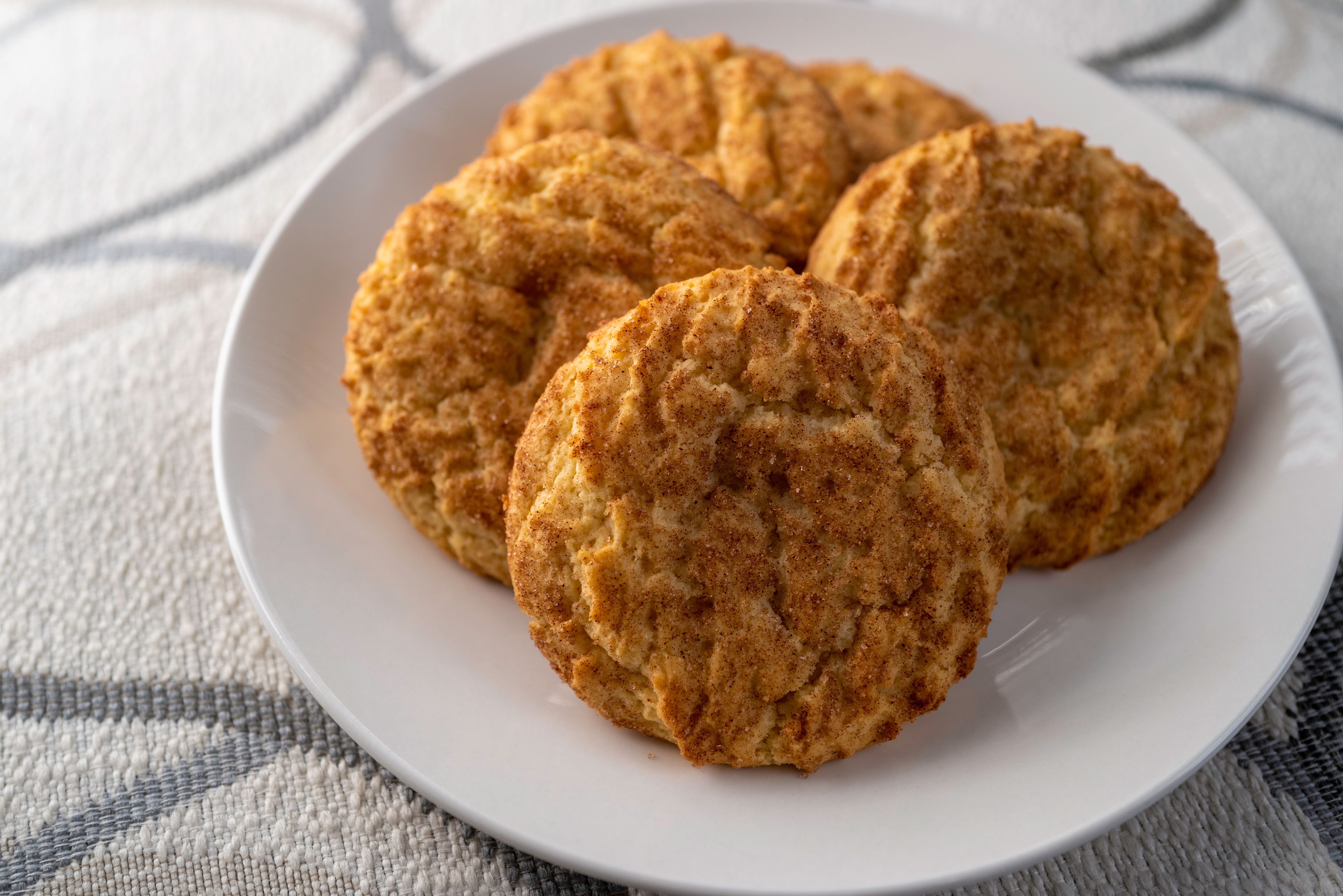 Cinnamon sugar cookies in a white plate Cinnamon sugar cookies in a white plate