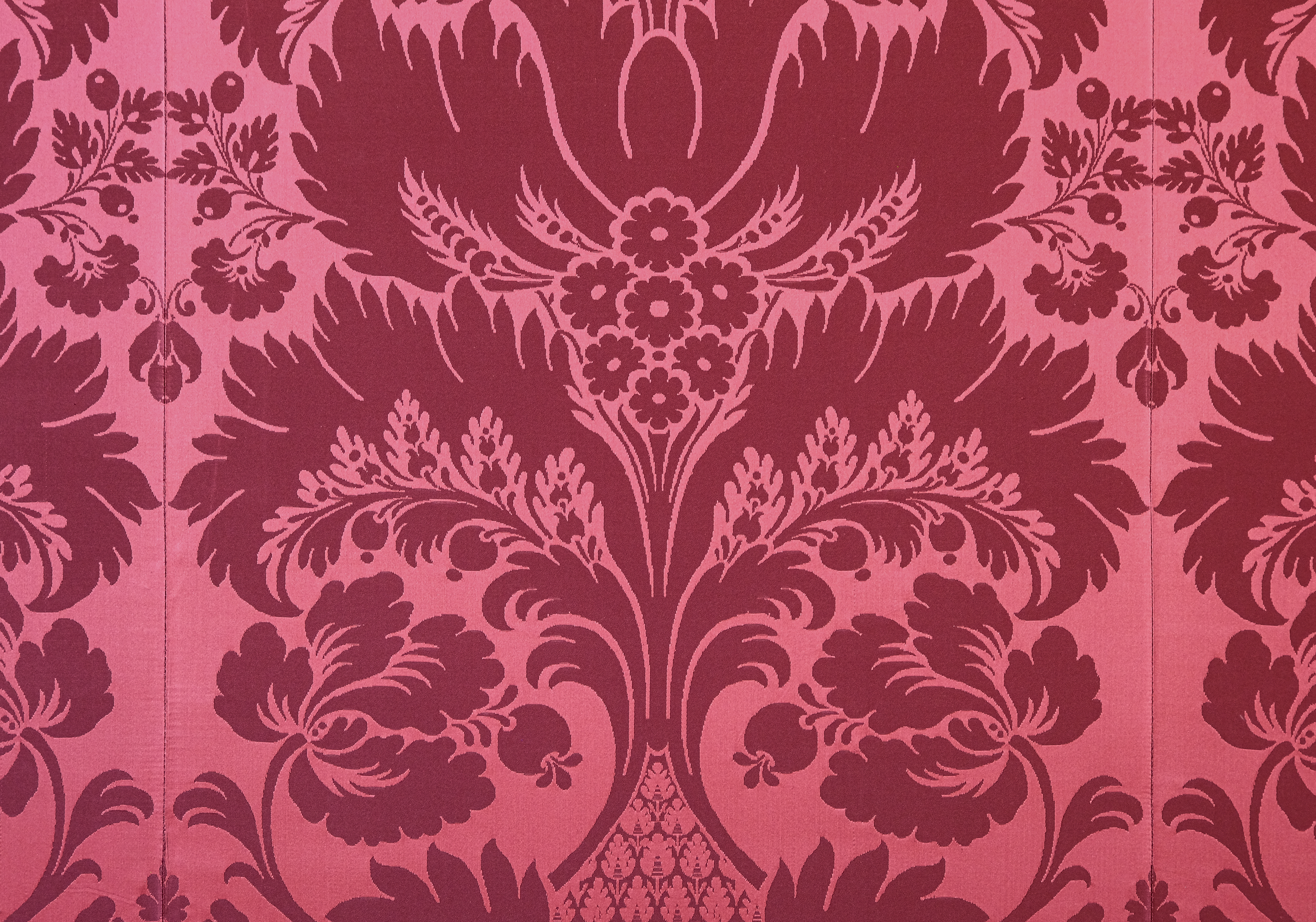 Close up of noble flower motif on wallpaper. Close up of noble flower motif on wallpaper.