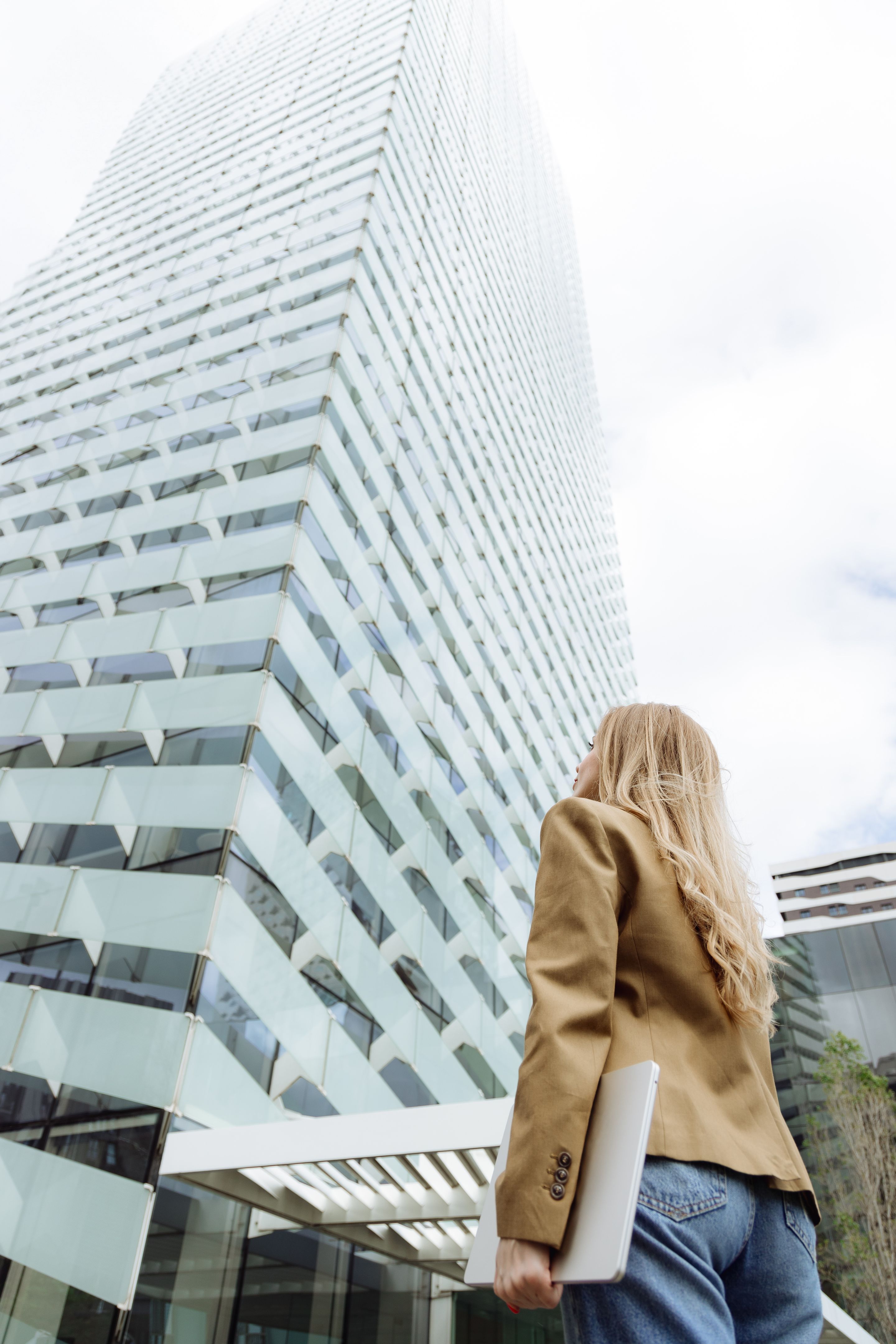 woman building career looking up woman building career looking up