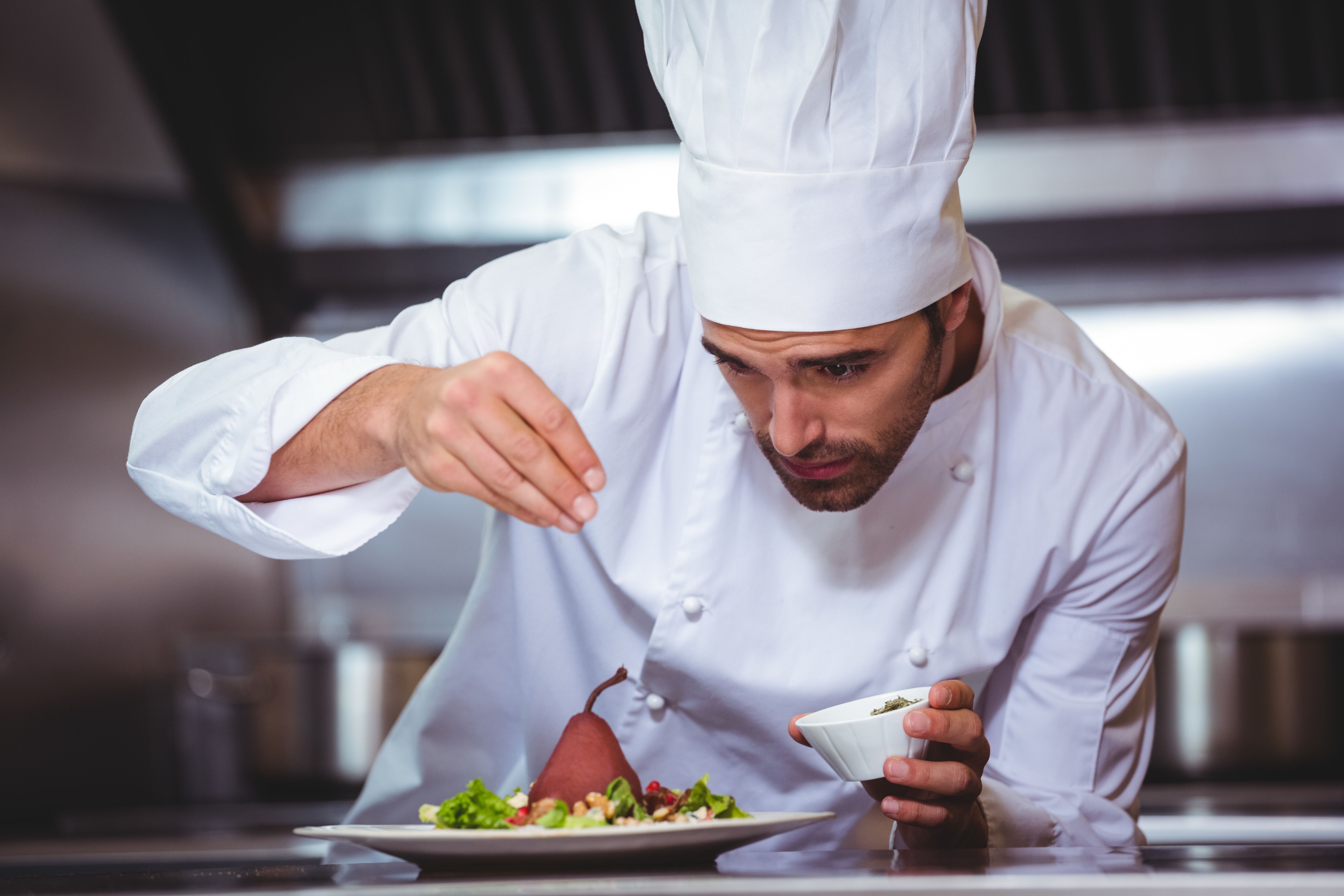 chef seasoning dish