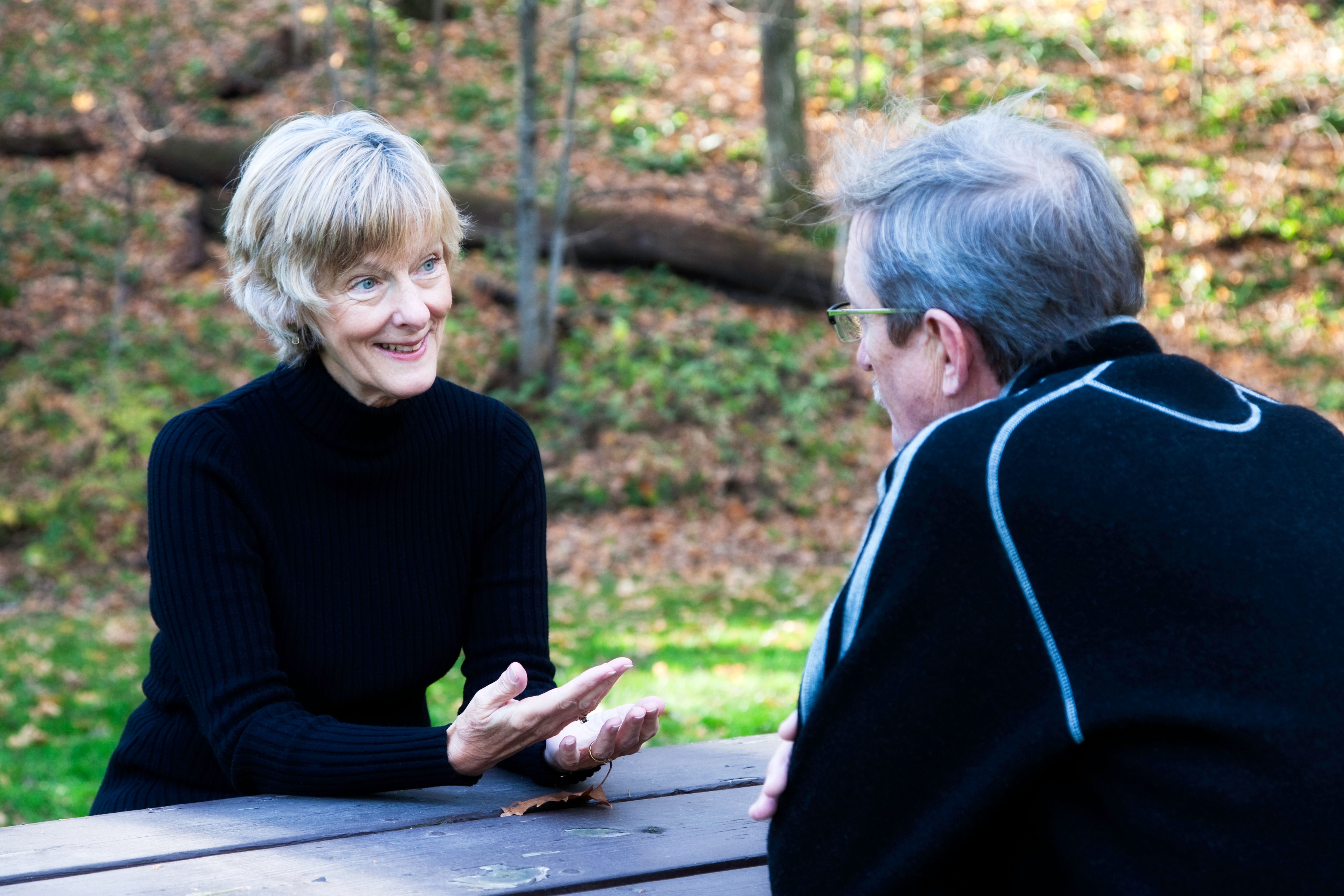 Beautiful Senior Woman Outside Doing Life Coaching Session