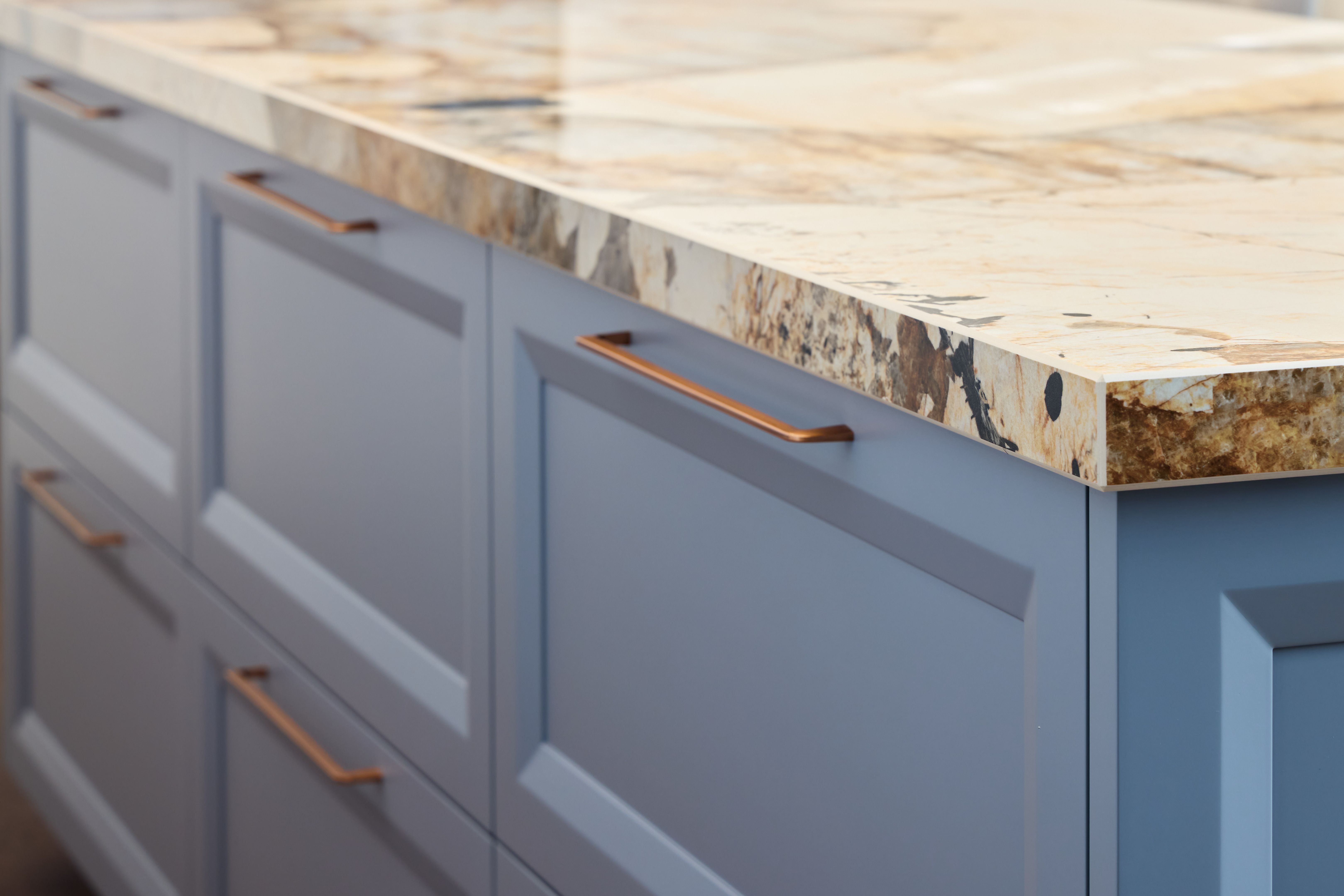 Discover Stylish Kitchen Cabinets Featuring an Elegant Marble Countertop for Your Home