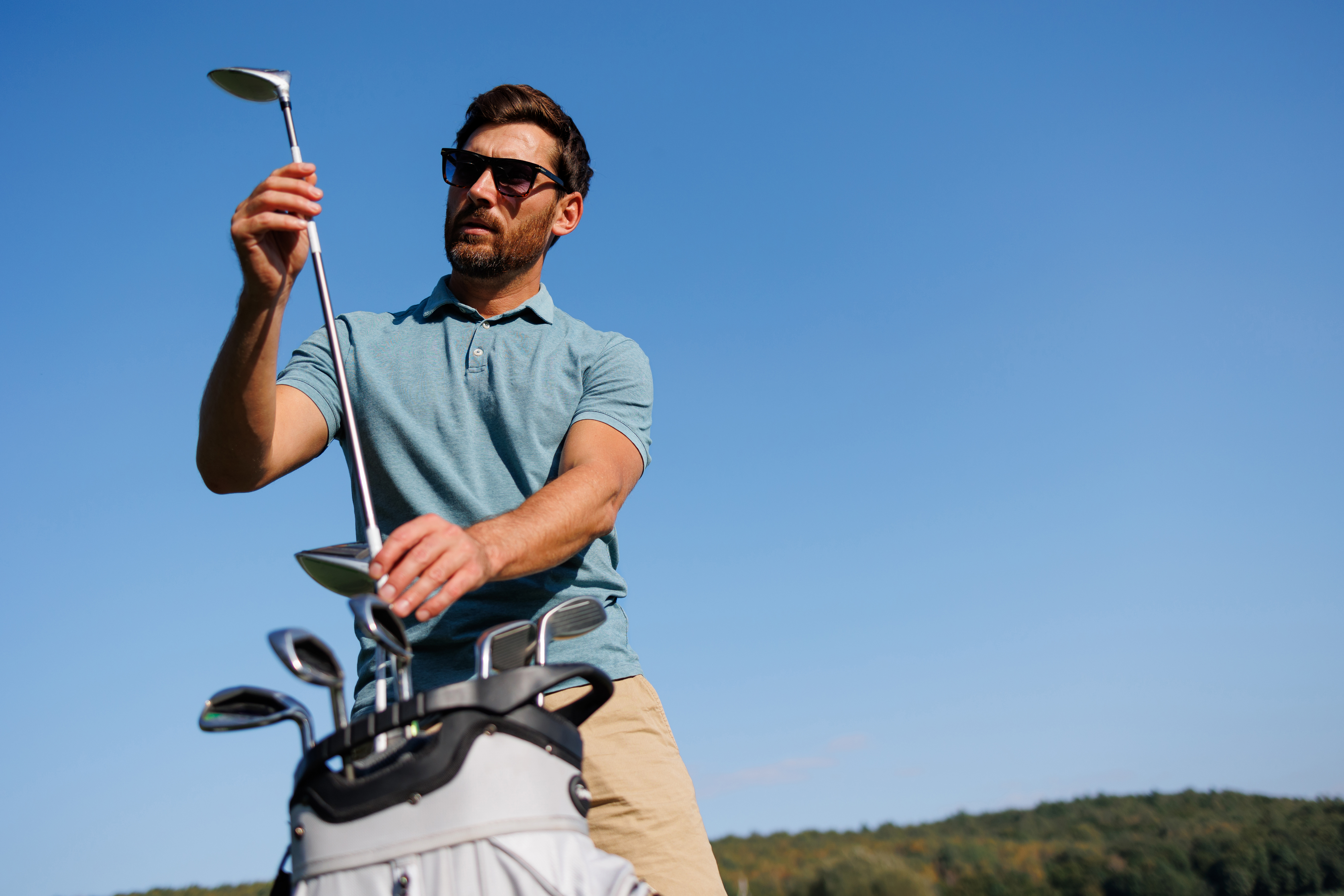 Golf Enthusiast Prepares for the Perfect Swing Golf Enthusiast Prepares for the Perfect Swing