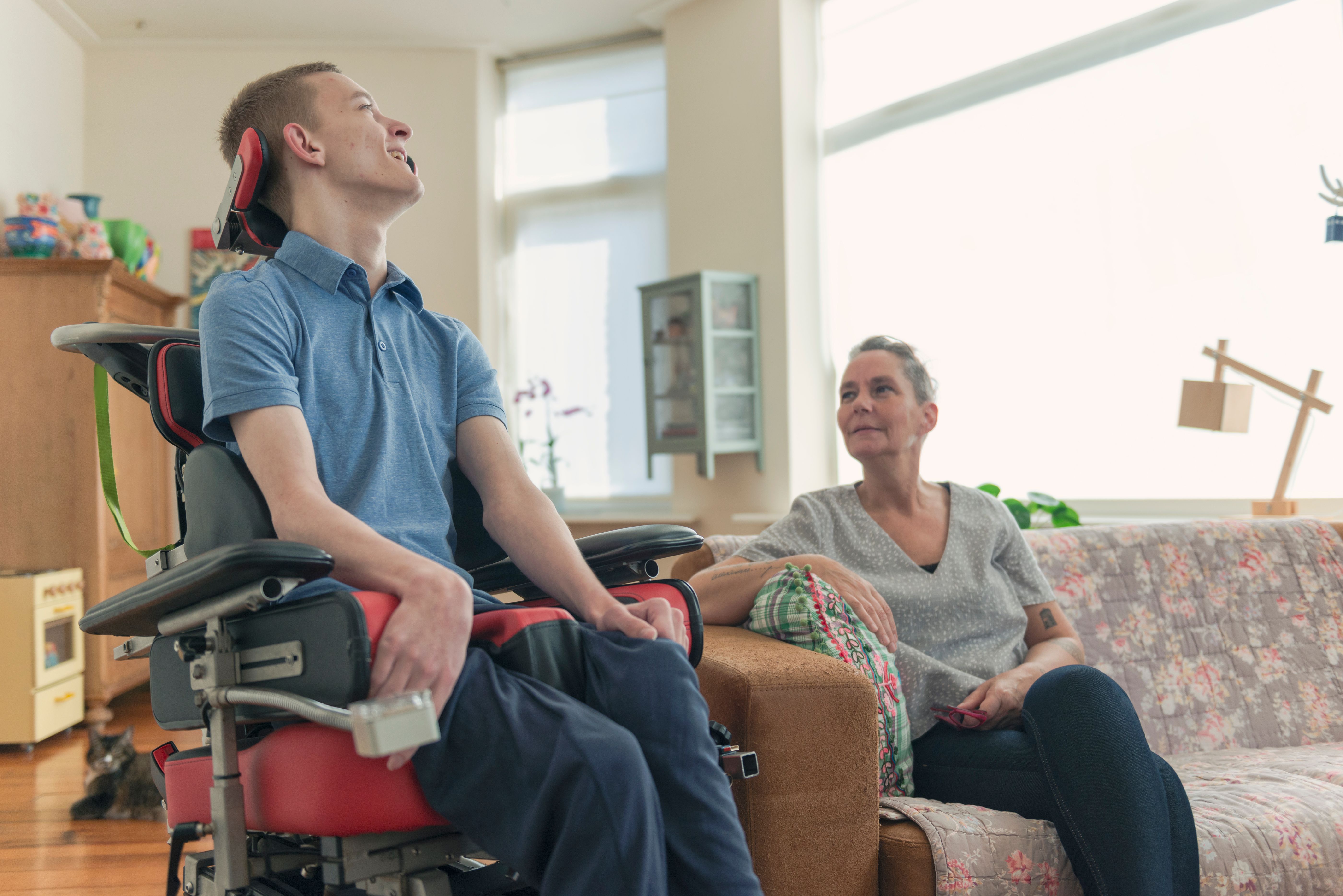 Young ALS patient with his mom