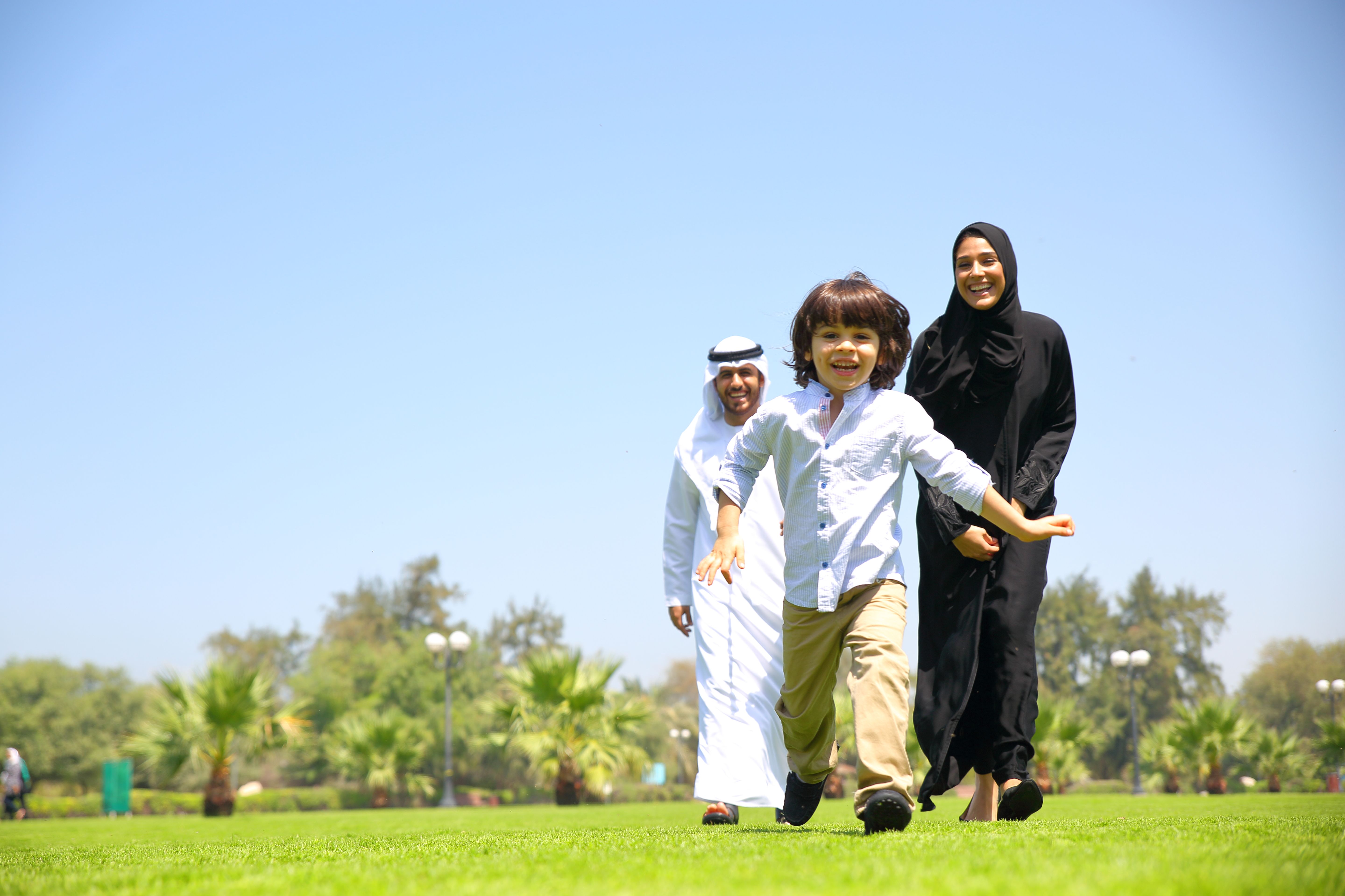 Arab Emirati family outdoors in park