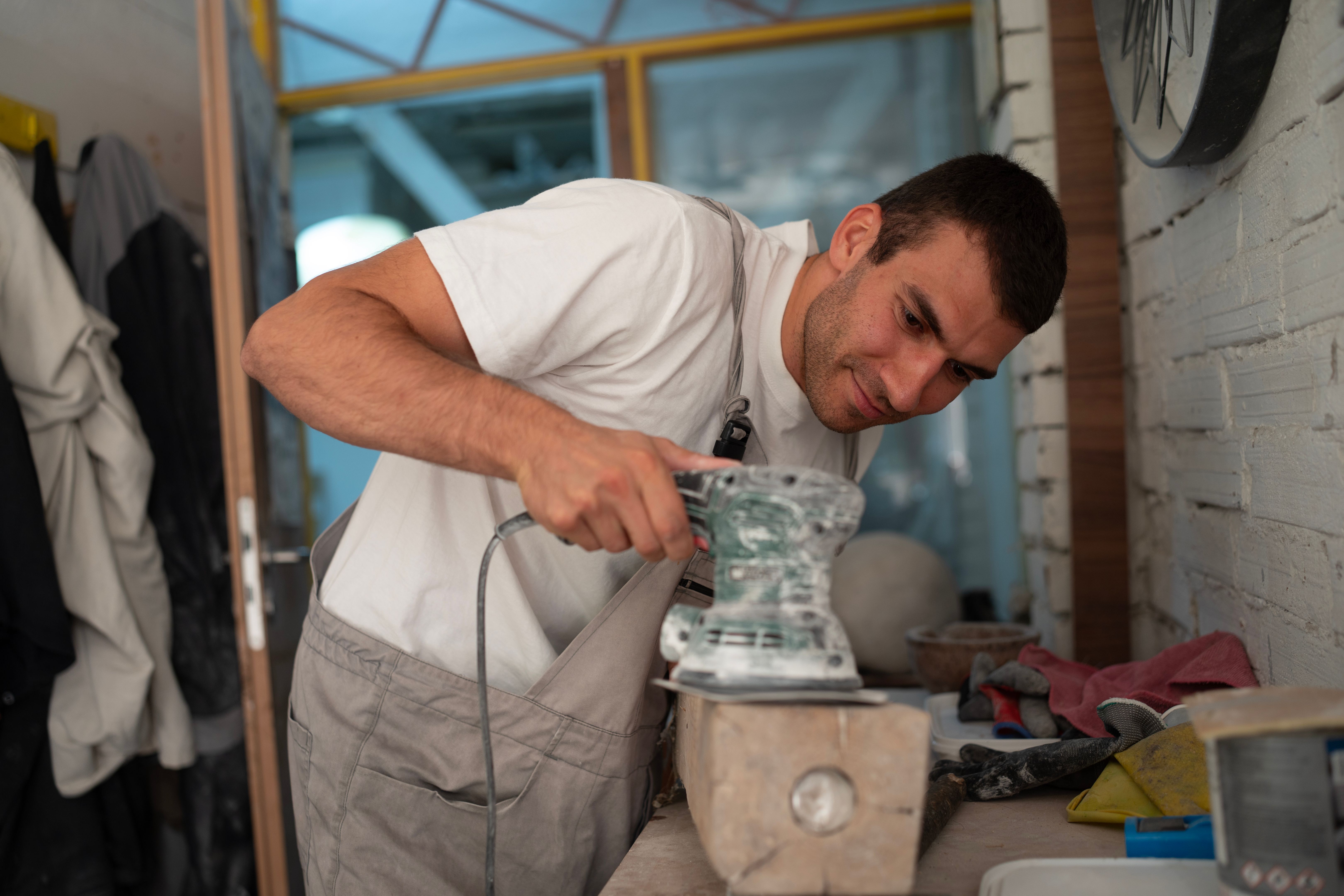 craftsman working stone