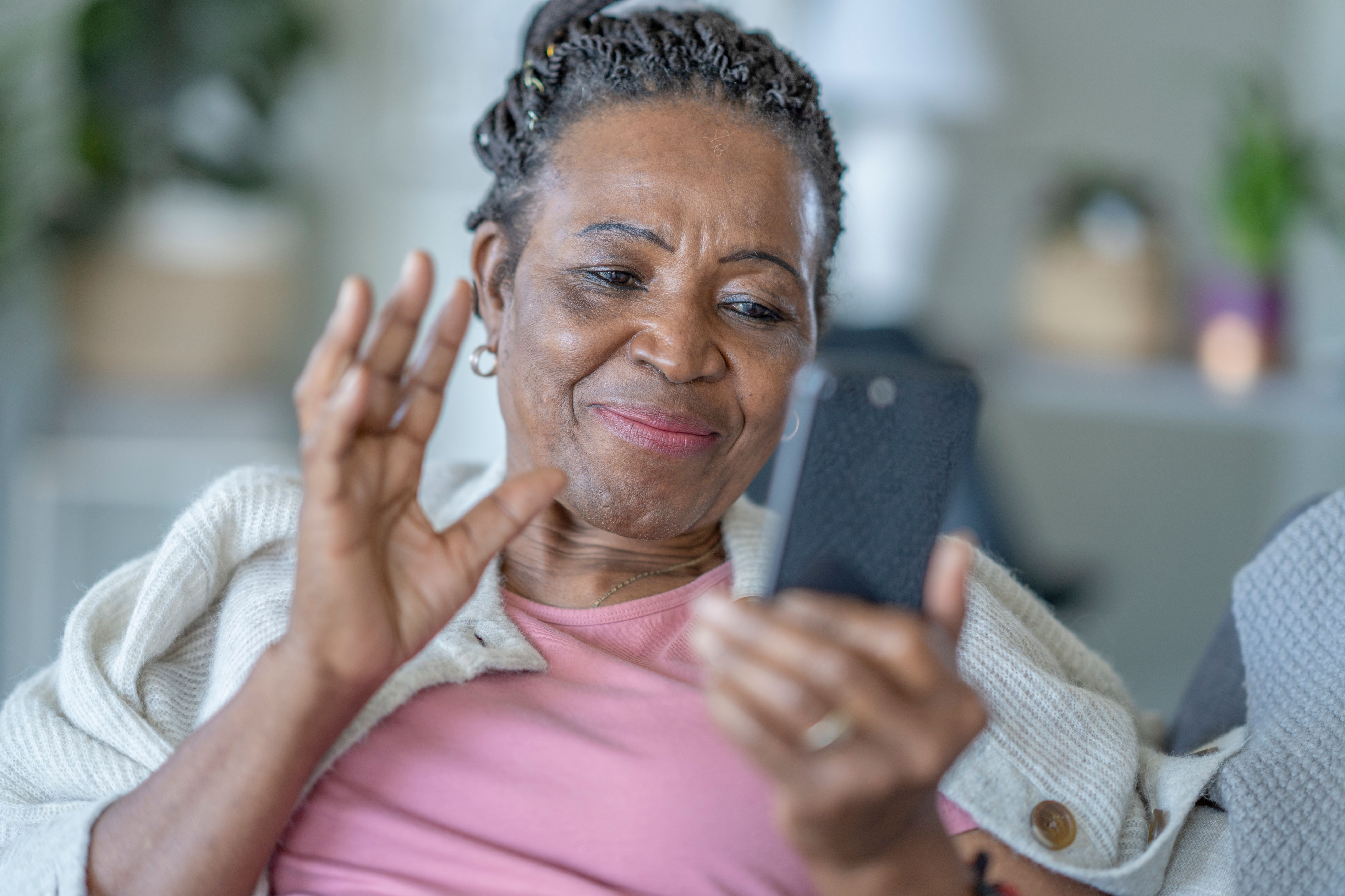 Telemedicine call between a senior woman and her doctor