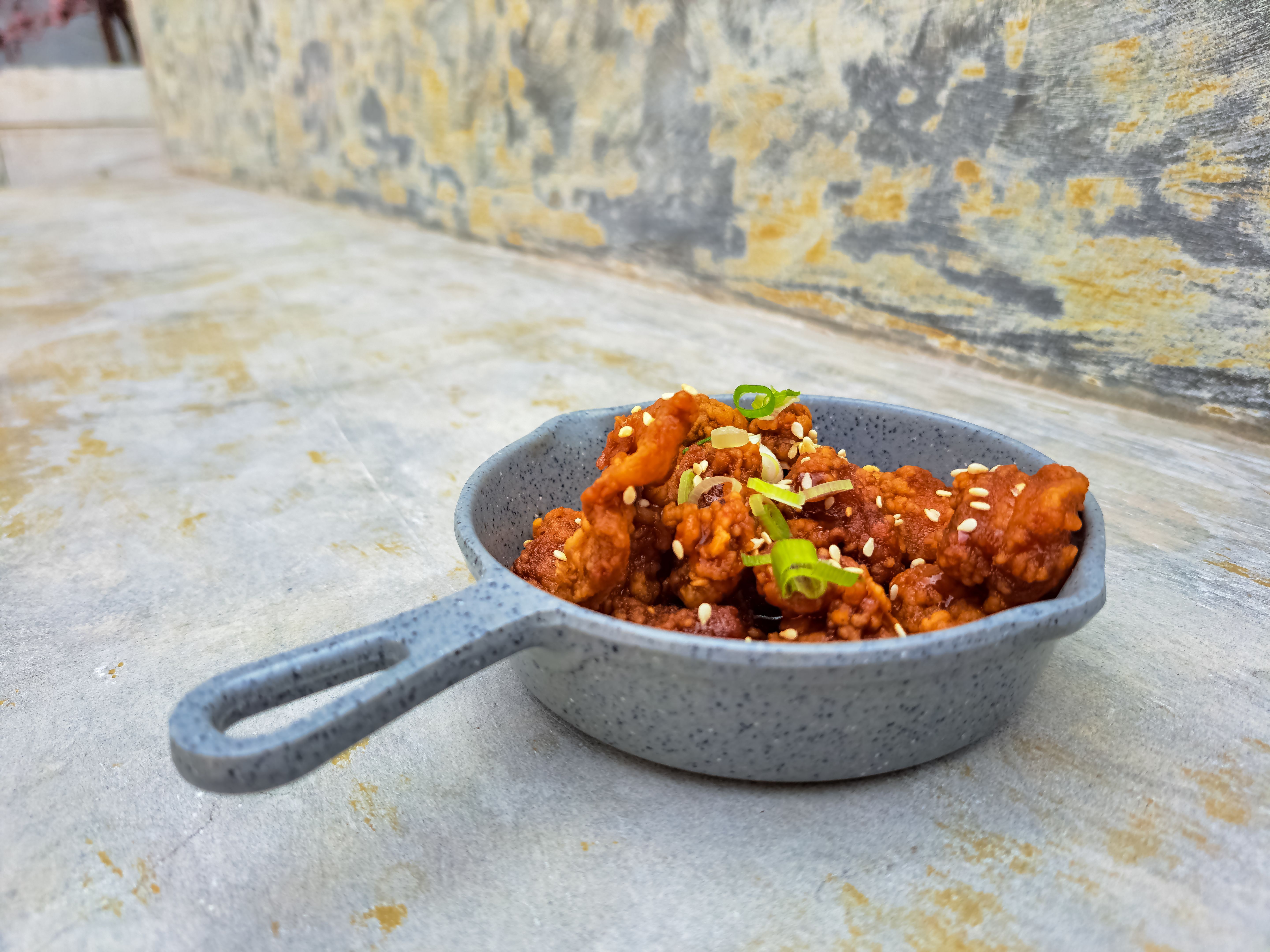 serving korean chicken