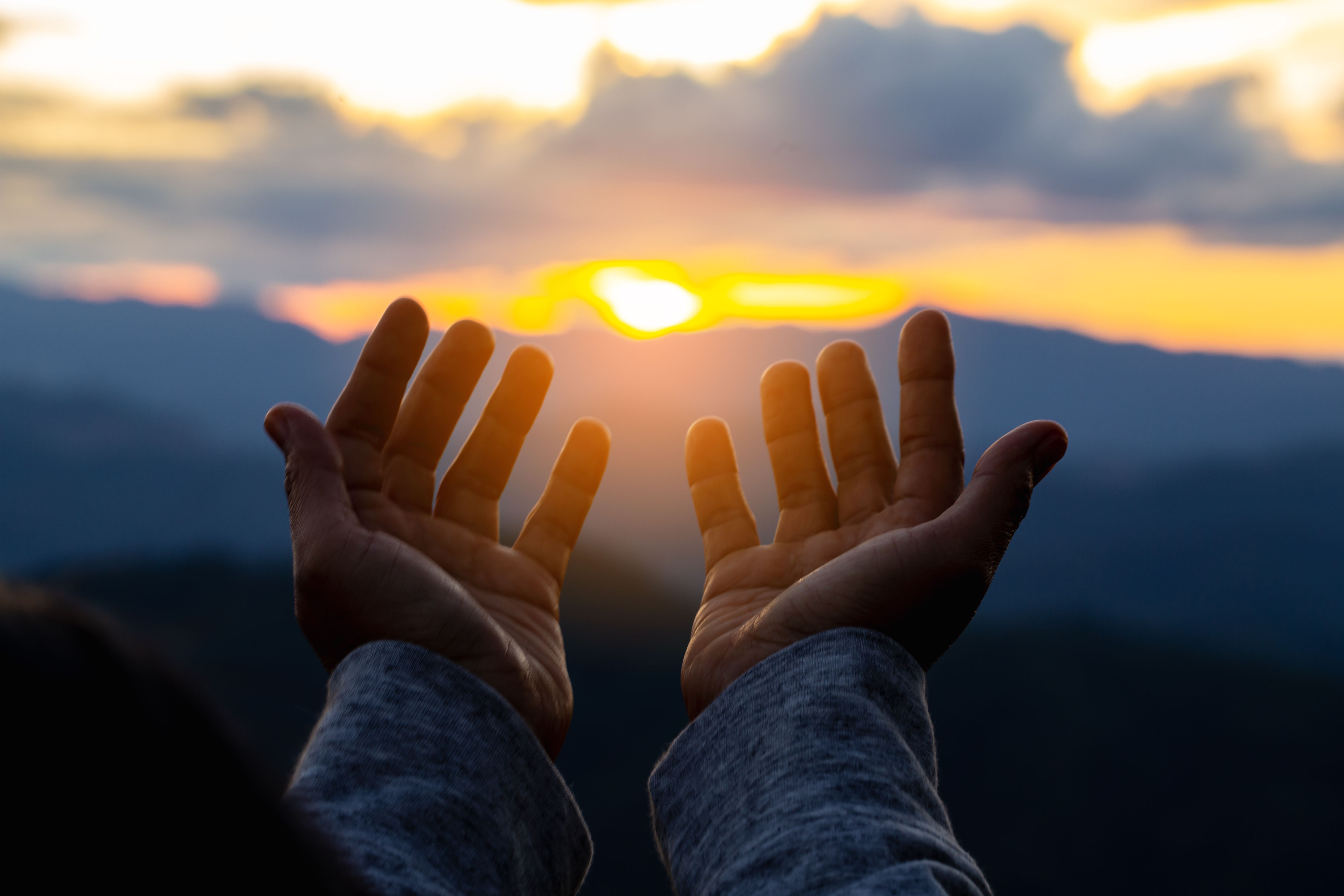 Close up christians hands pray to God with spiritual faith on holy bible in catholic church religion worship prayer ask god bless pray grace jesus believe Christianity religion prayer holy worship.