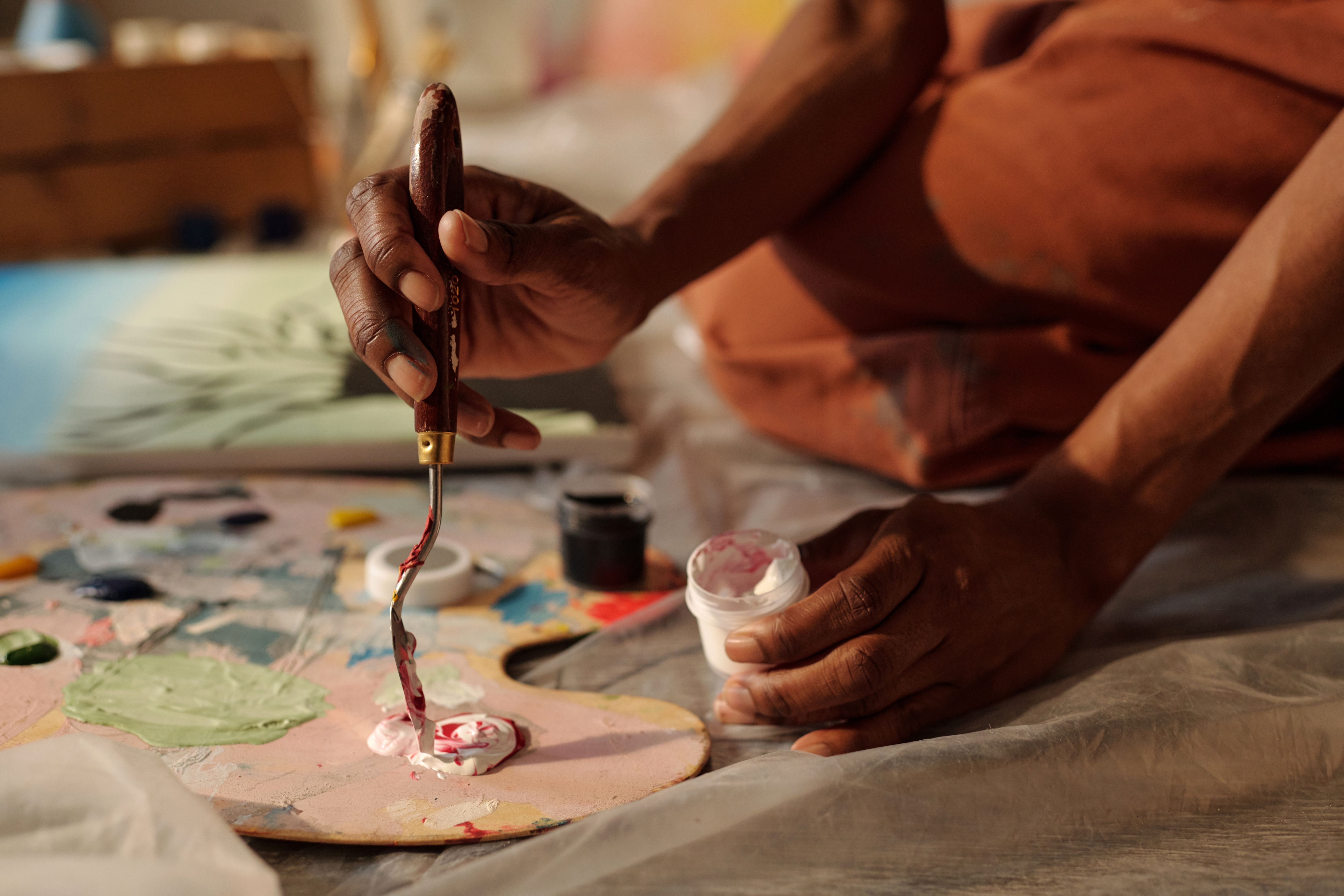 artist mixing colors