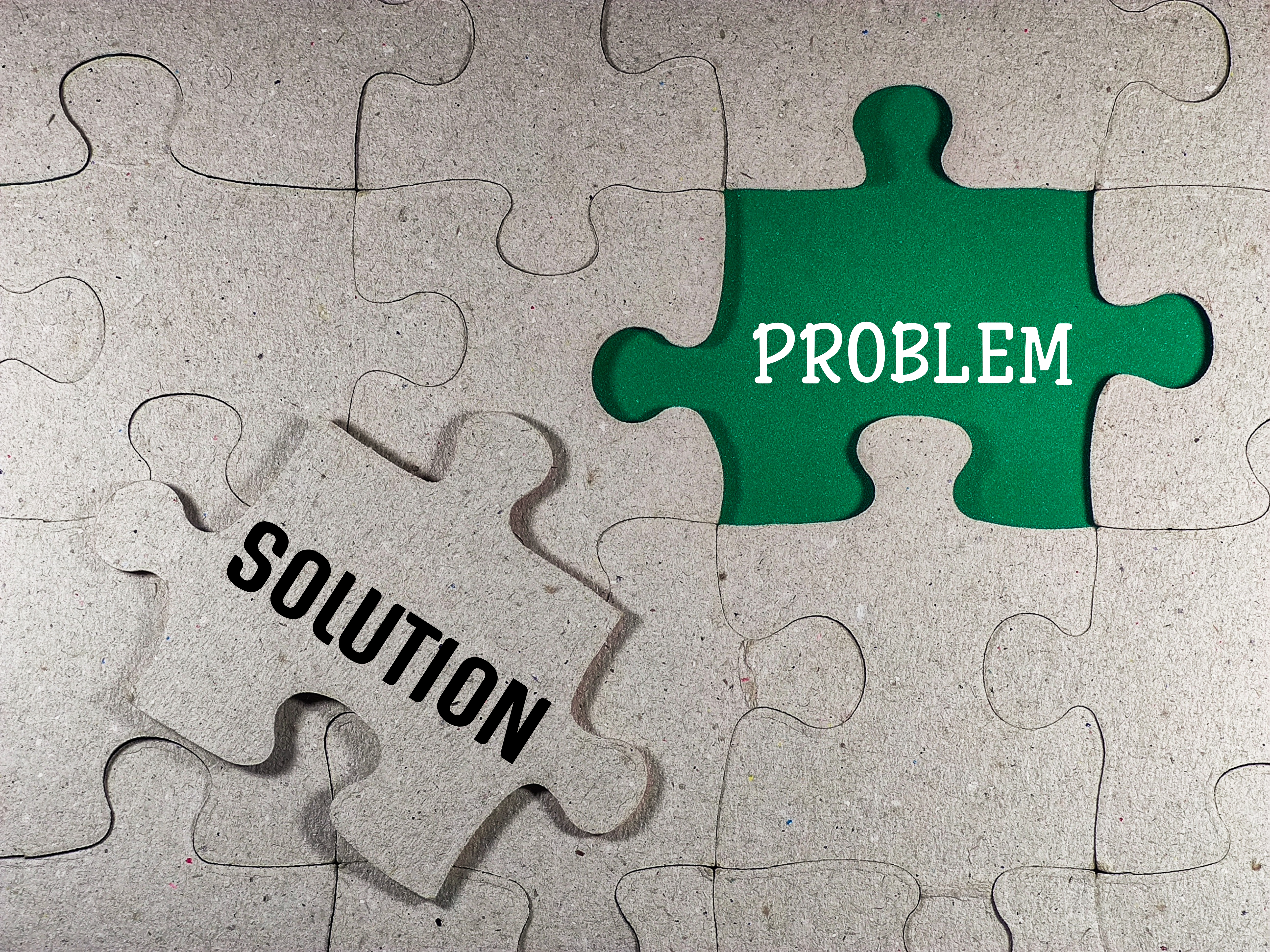 Management concept with puzzle piece with problem solving and solution