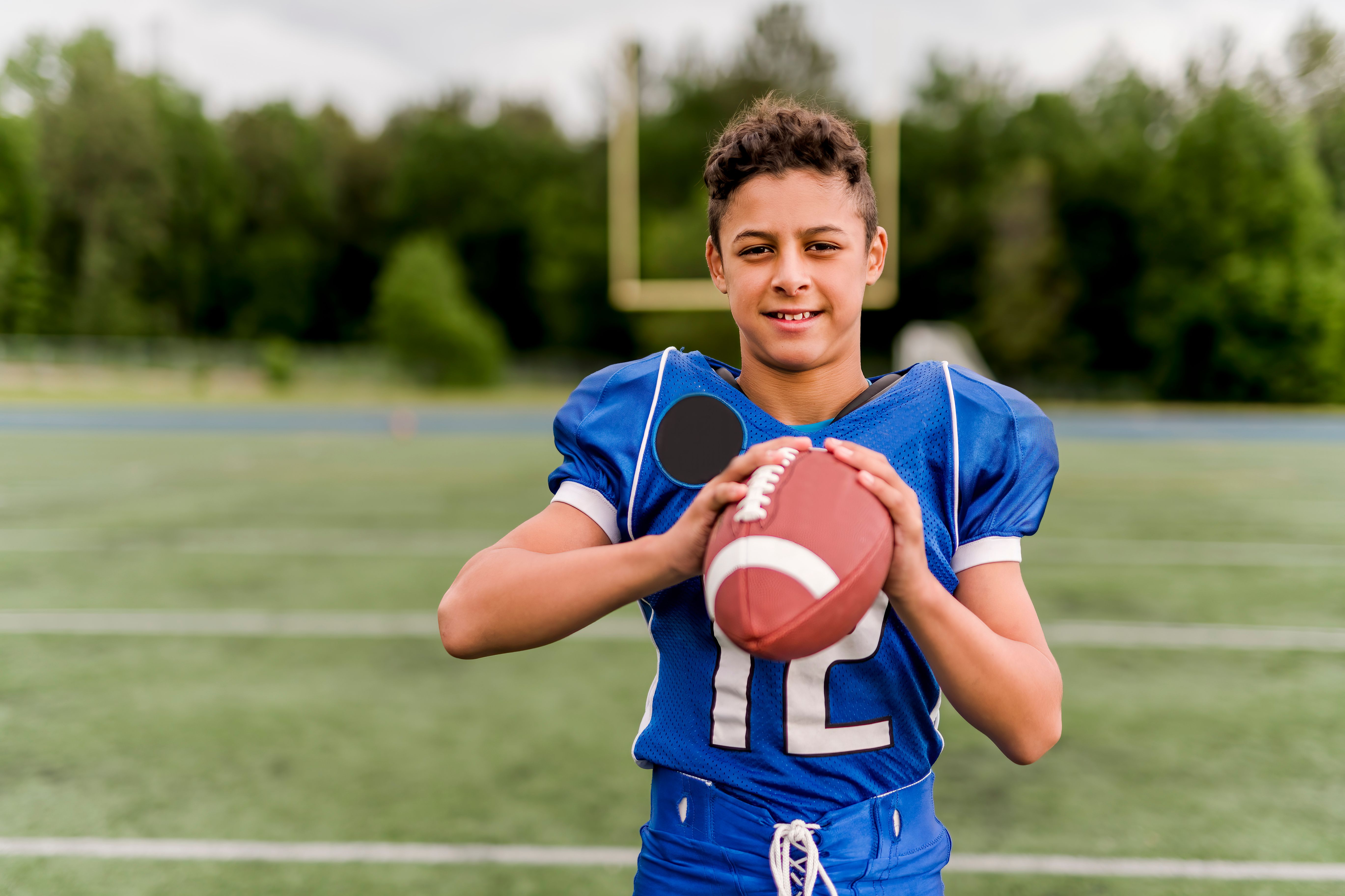 children playing football