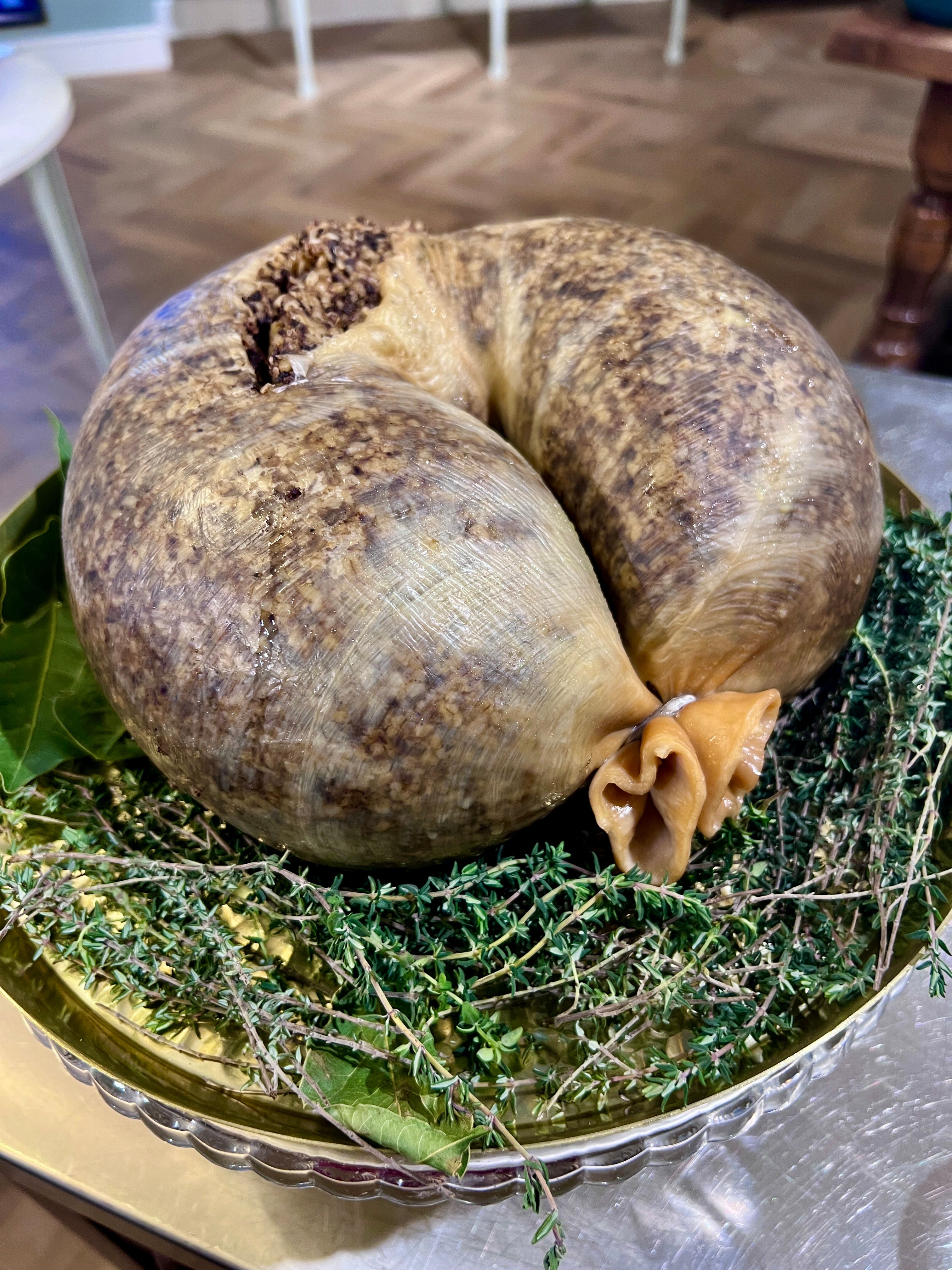 Traditional Scottish Haggis on a plate, close up. Traditional Scottish Haggis on a plate, close up.